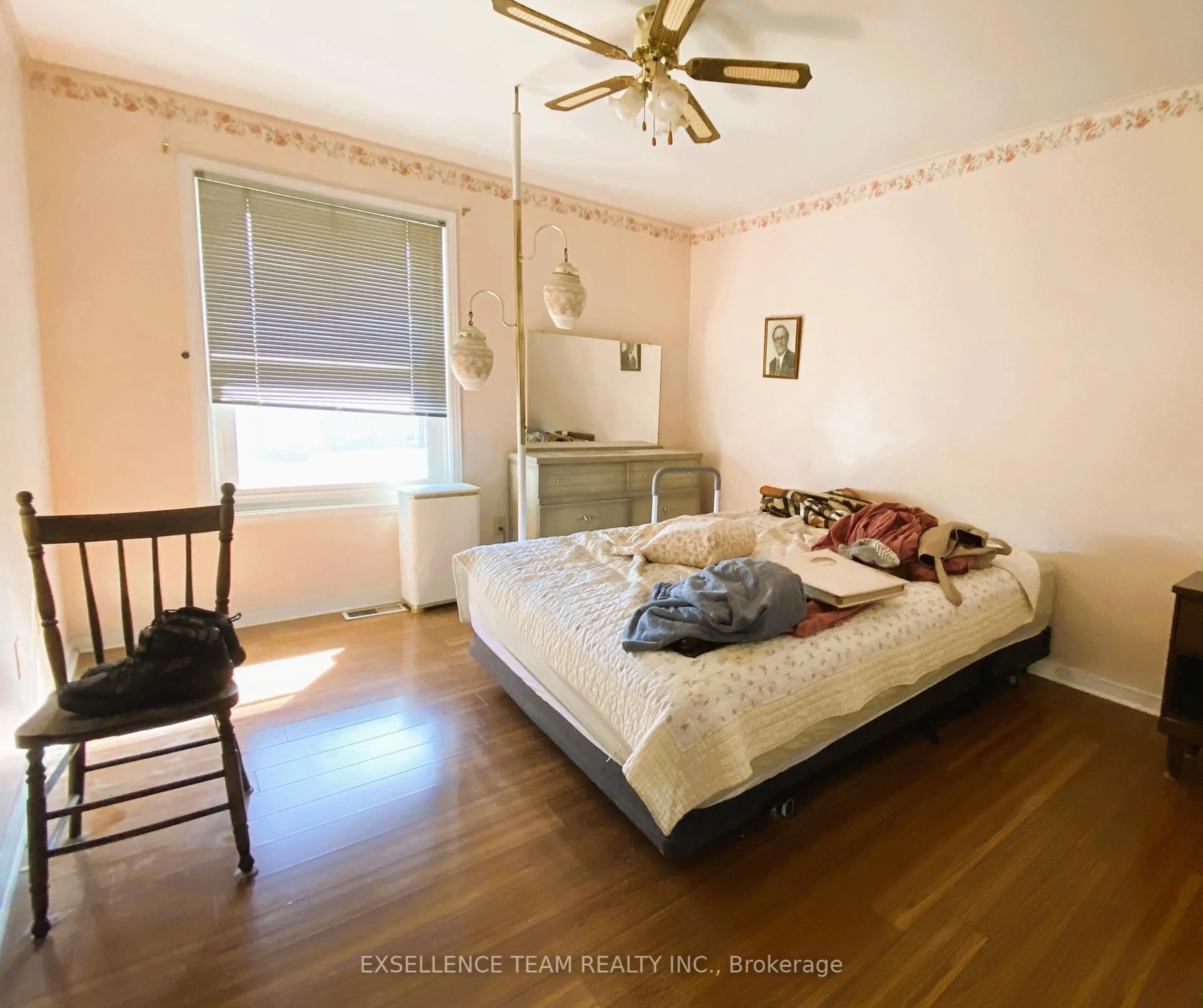 Bedroom with bed, wood/laminate floor for 89 St Lawrence St, South Stormont Ontario K0C 1M0