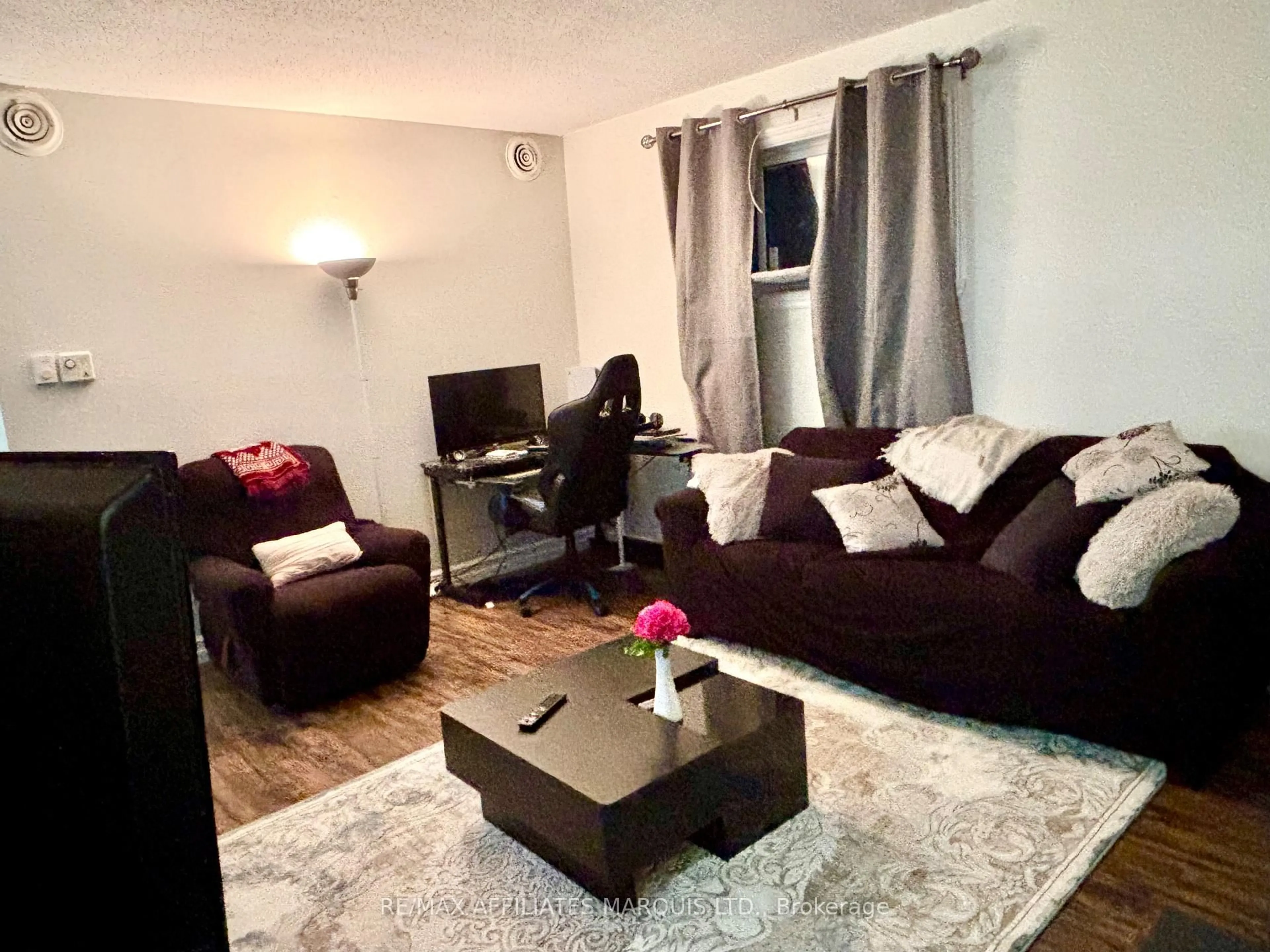 Living room with furniture, wood/laminate floor for 65 Race St #4, Cornwall Ontario K6H 1G7