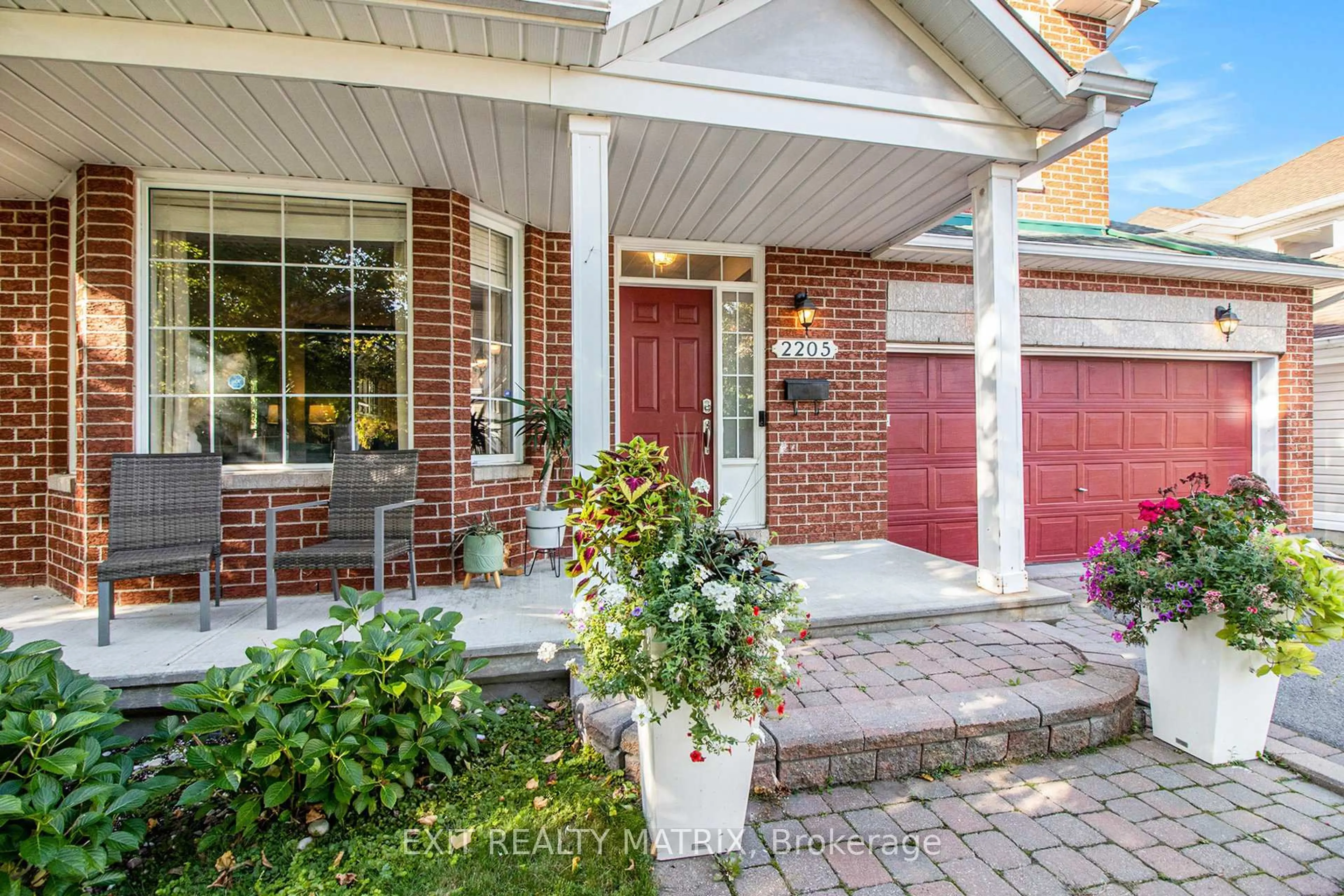Home with brick exterior material, street for 2205 Blue Willow Cres, Orleans Ontario K1W 1K6