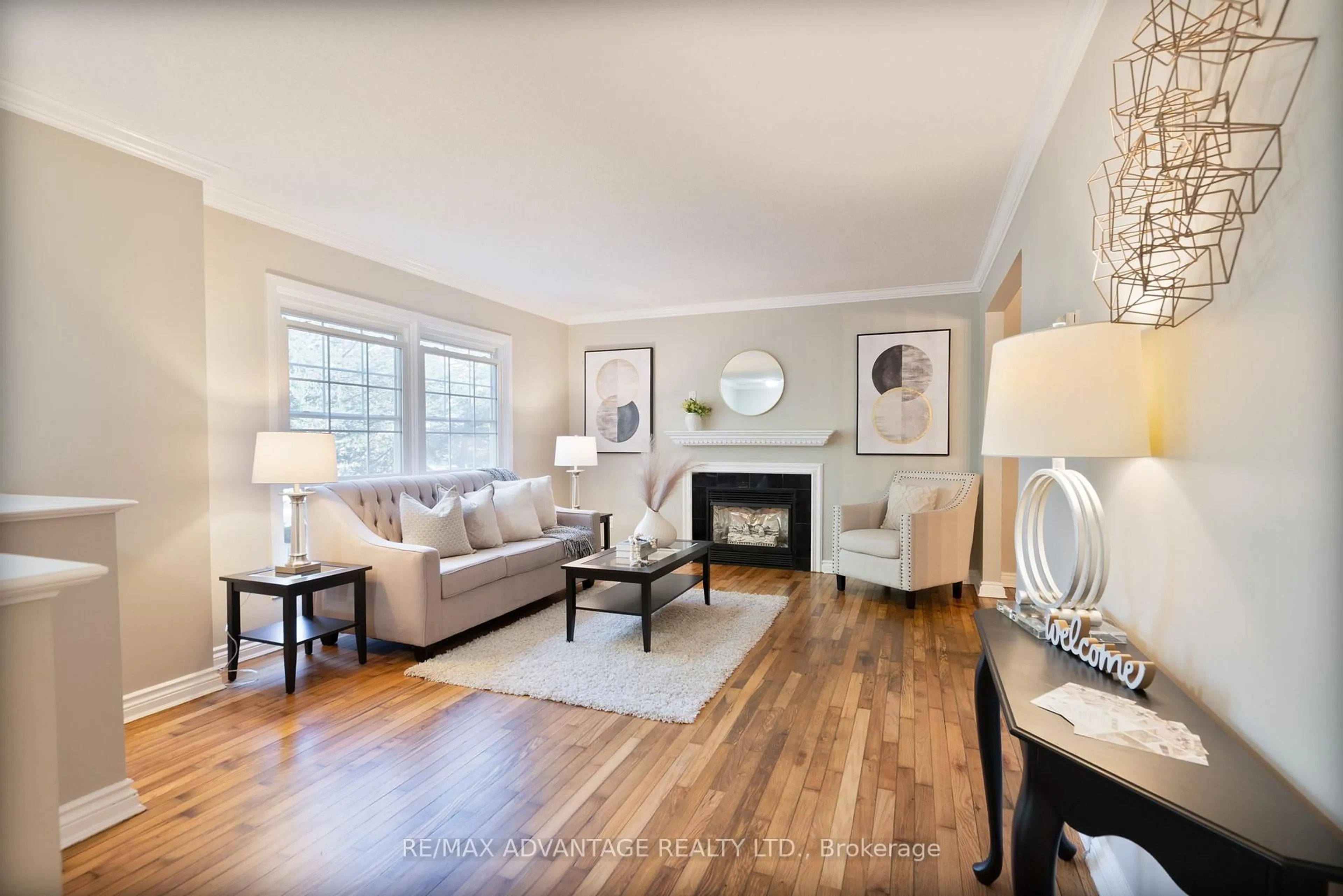 Living room with furniture, wood/laminate floor for 621 Cranbrook Rd #8, London South Ontario N6K 2Y4