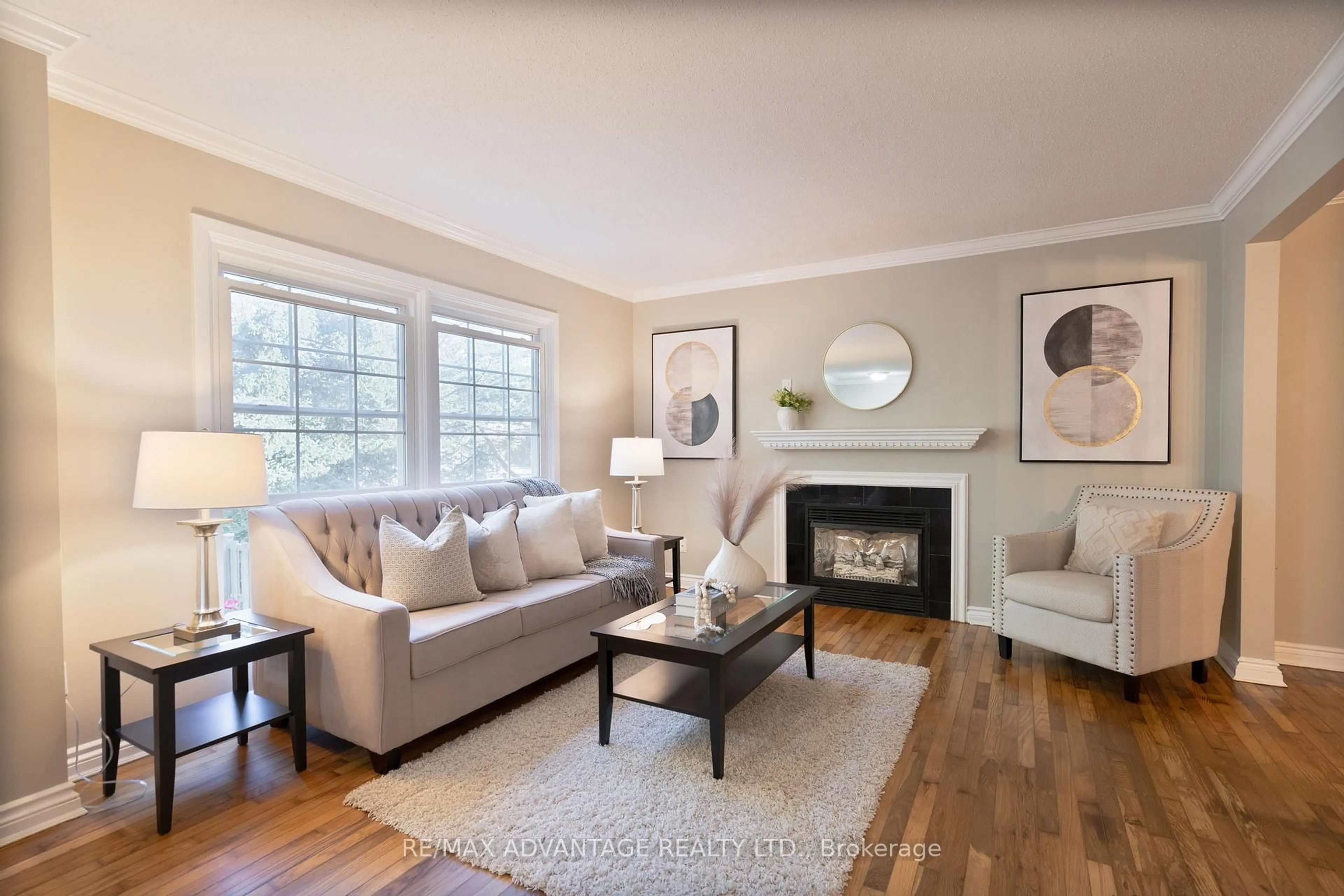 Living room with furniture, wood/laminate floor for 621 Cranbrook Rd #8, London South Ontario N6K 2Y4