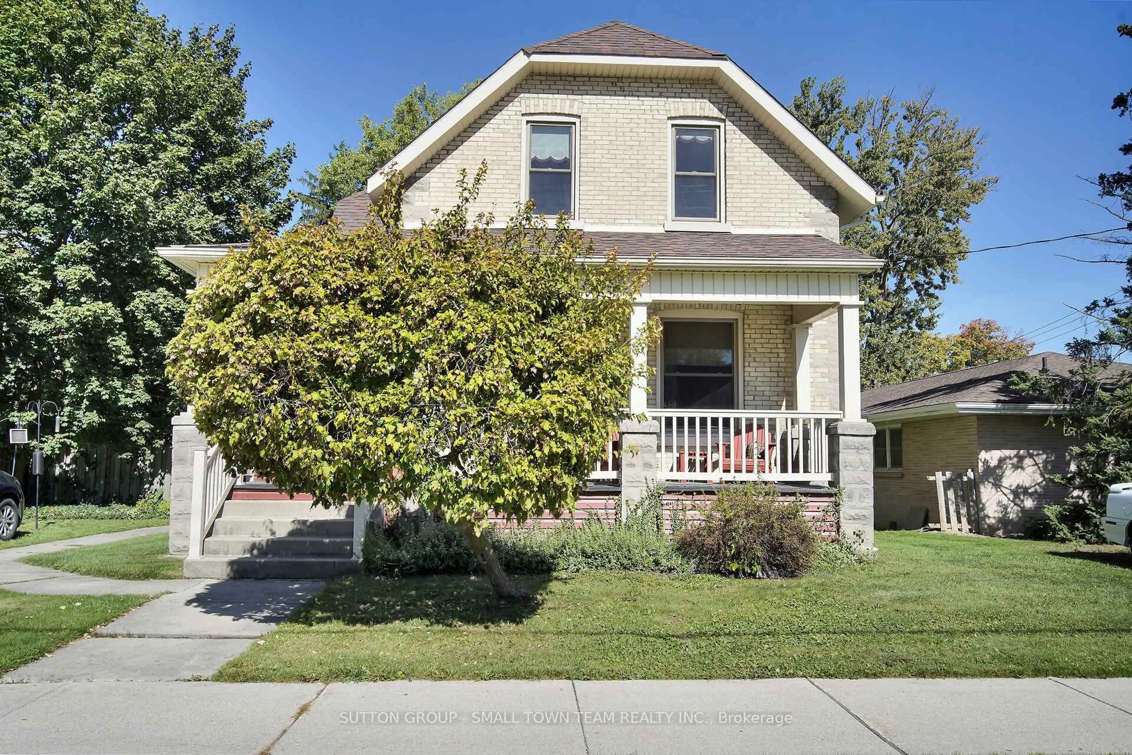 Home with brick exterior material, street for 50 Huron St, South Huron Ontario N0M 1S2