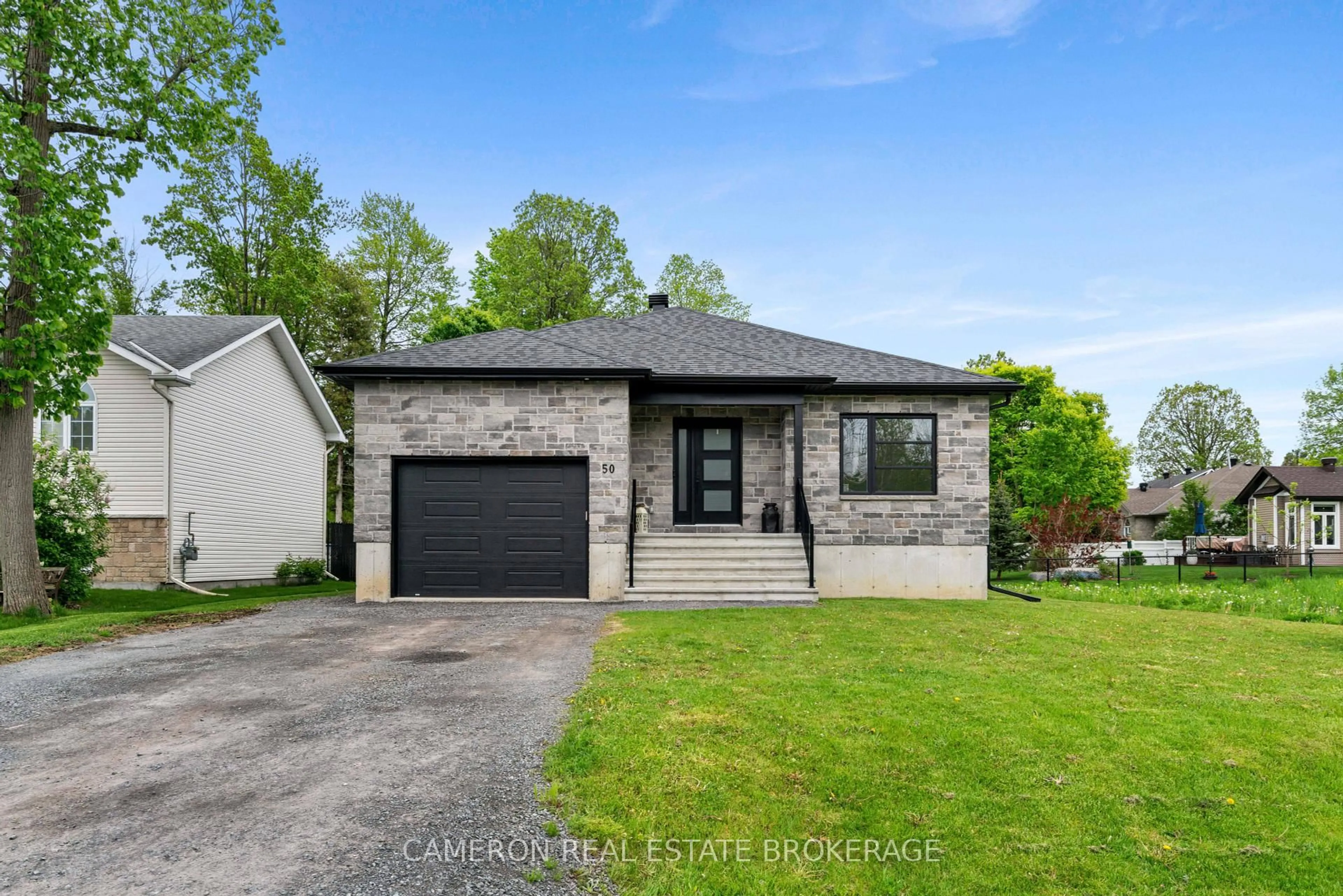 Home with brick exterior material, street for 50 Beech St, South Stormont Ontario K0C 1M0