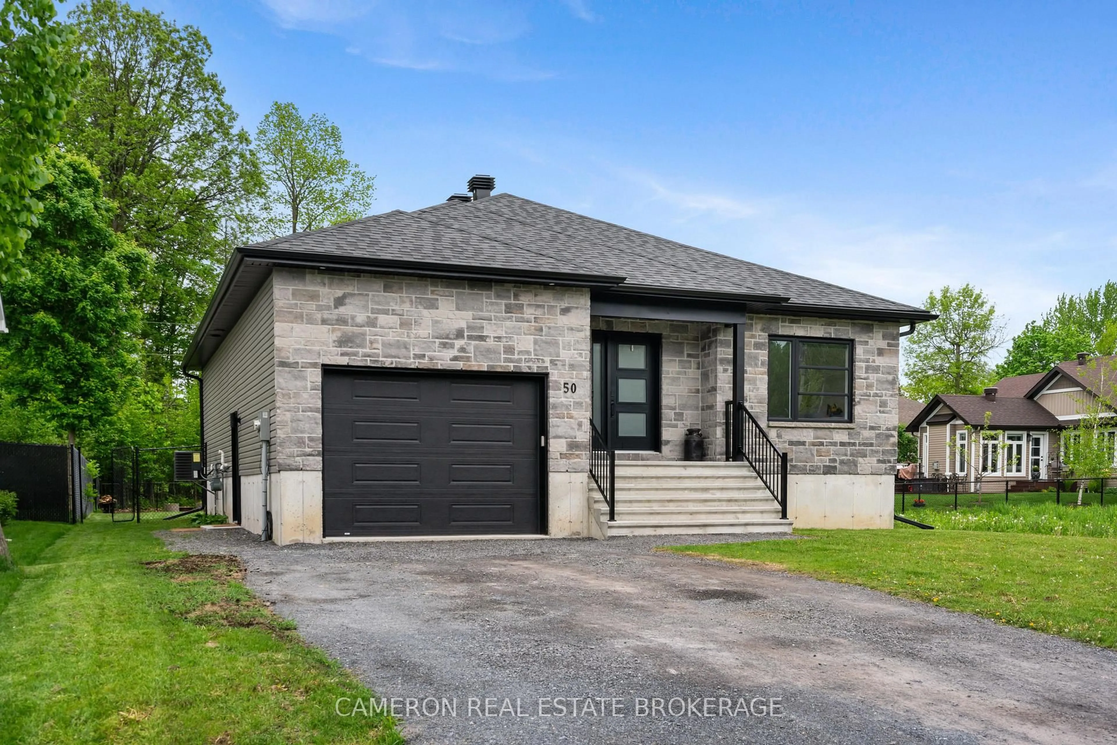 Home with brick exterior material, street for 50 Beech St, South Stormont Ontario K0C 1M0