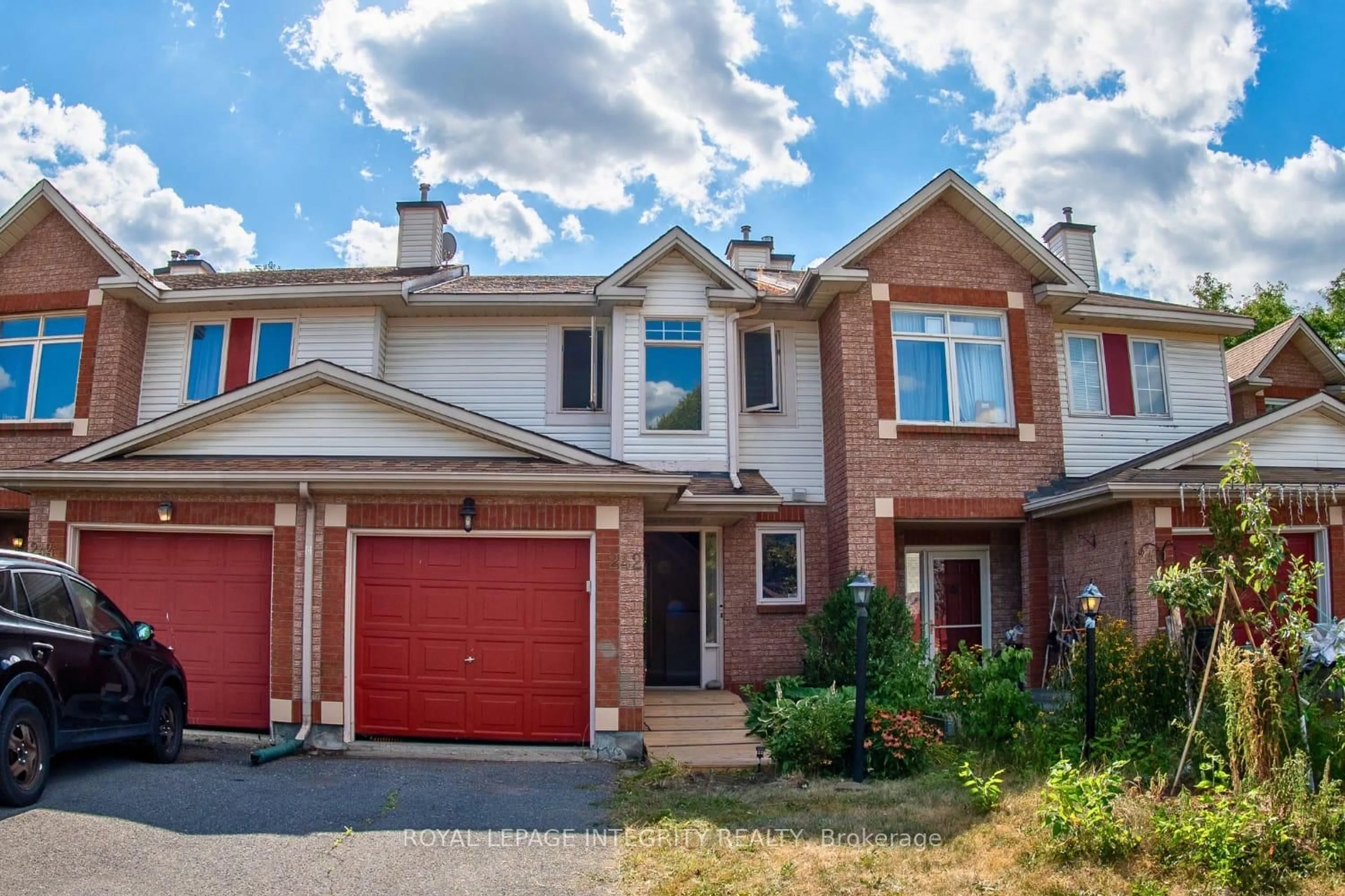Home with brick exterior material, street for 242 Beatrice Dr, Ottawa Ontario K2J 4P1