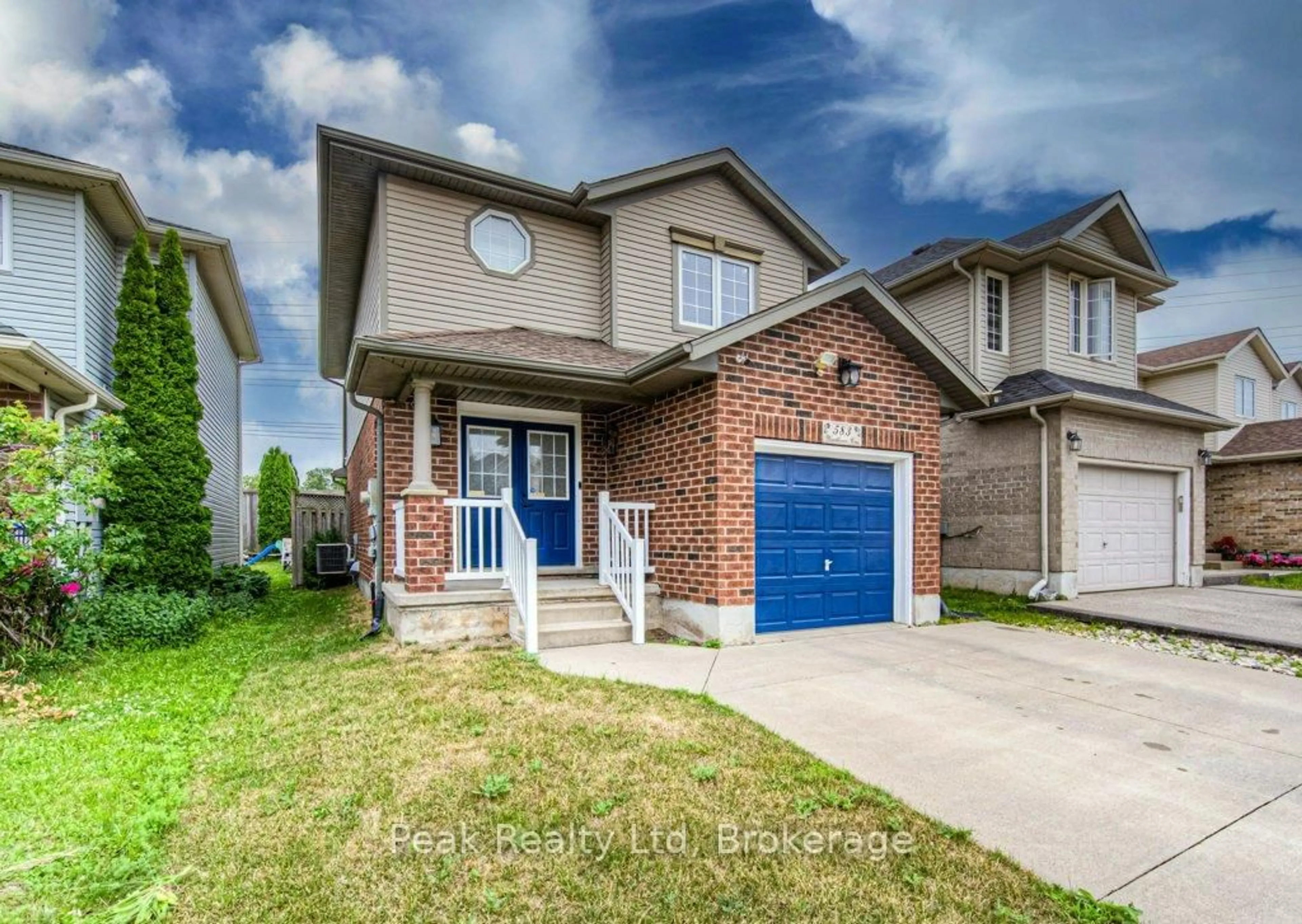 Home with brick exterior material, street for 583 Windflower Cres, Kitchener Ontario N2E 4E3