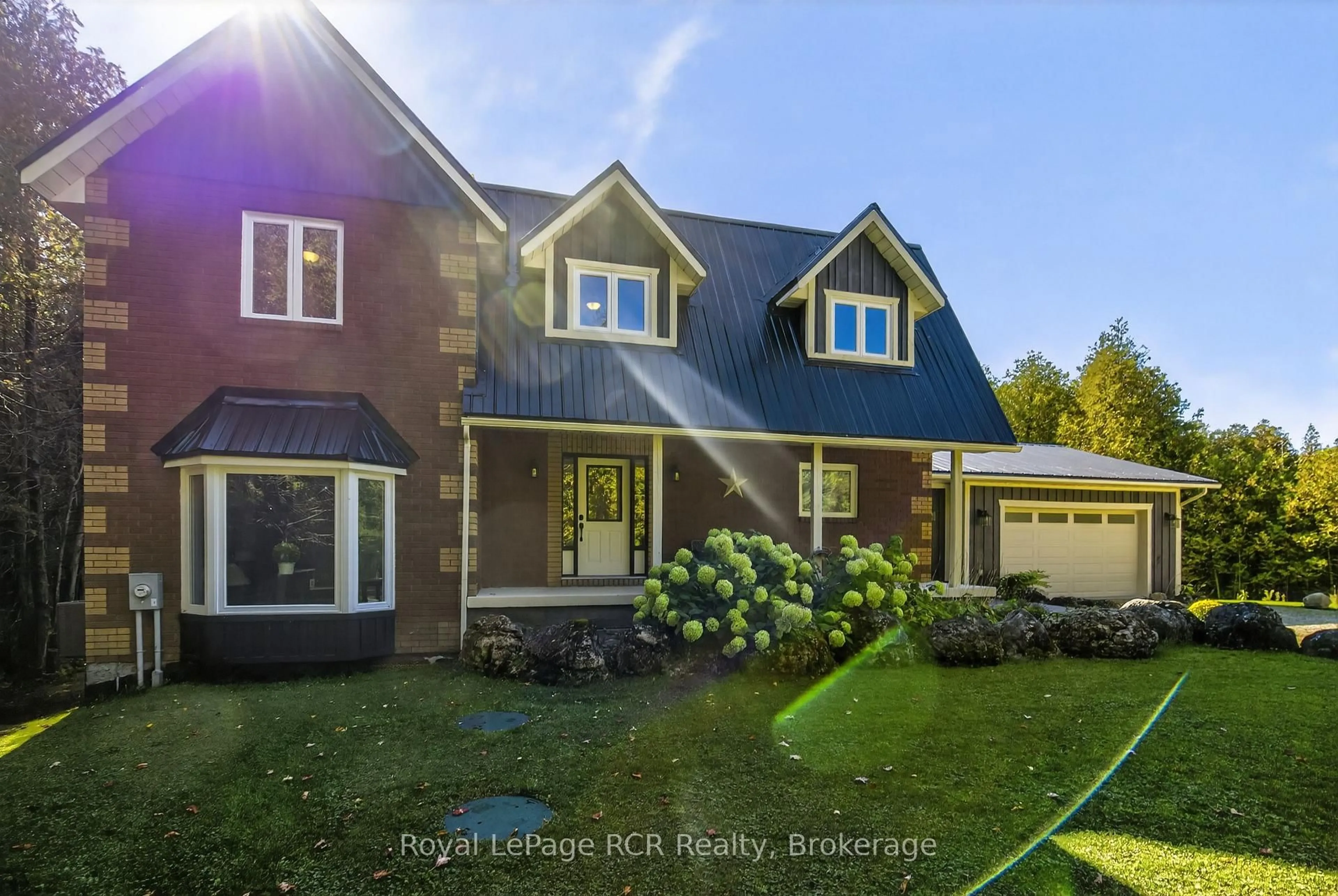 Home with vinyl exterior material, street for 468080 Concession 12B Concession, Grey Highlands Ontario N0C 1C0