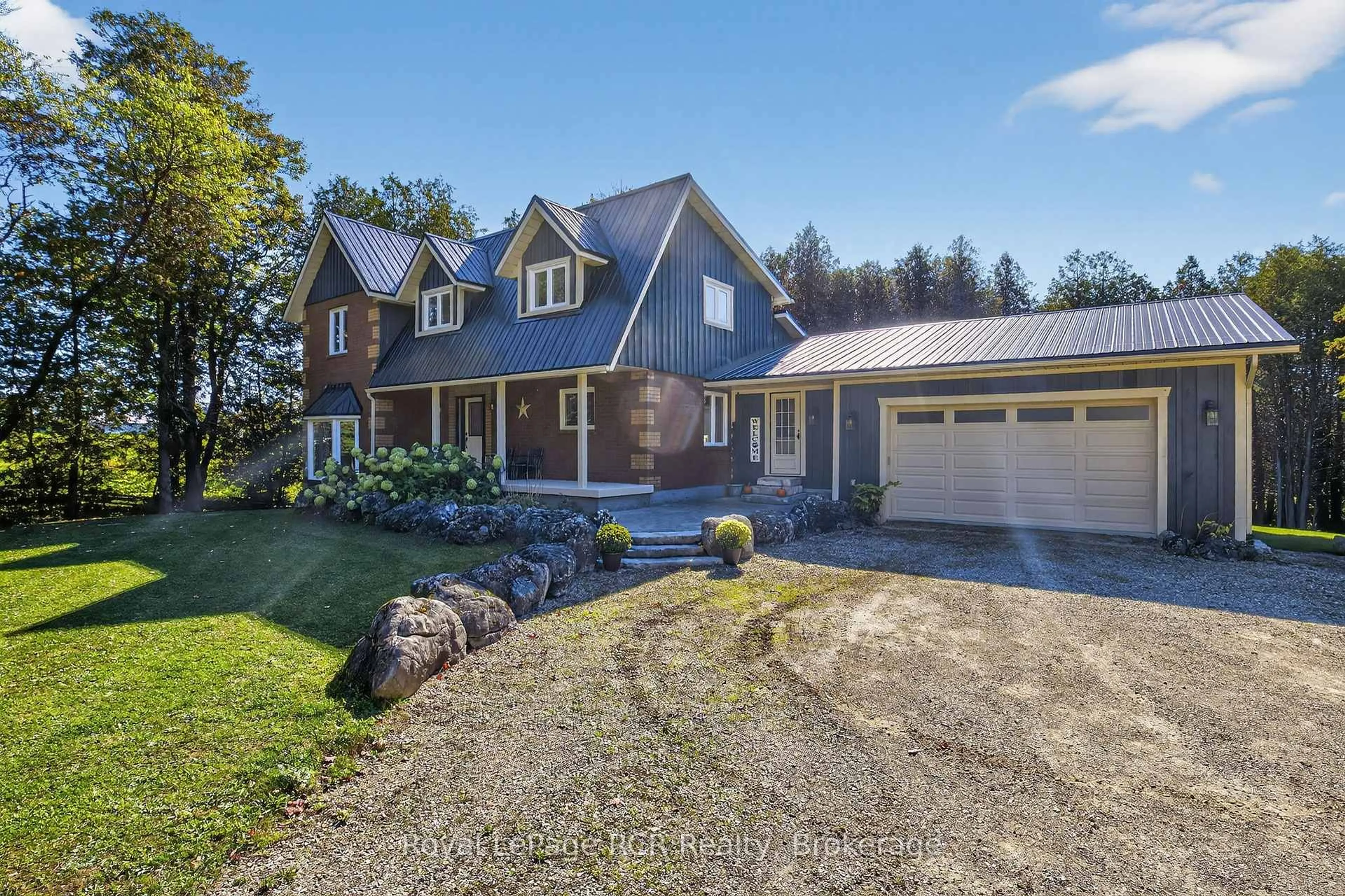 A pic from outside/outdoor area/front of a property/back of a property/a pic from drone, street for 468080 Concession 12B Concession, Grey Highlands Ontario N0C 1C0