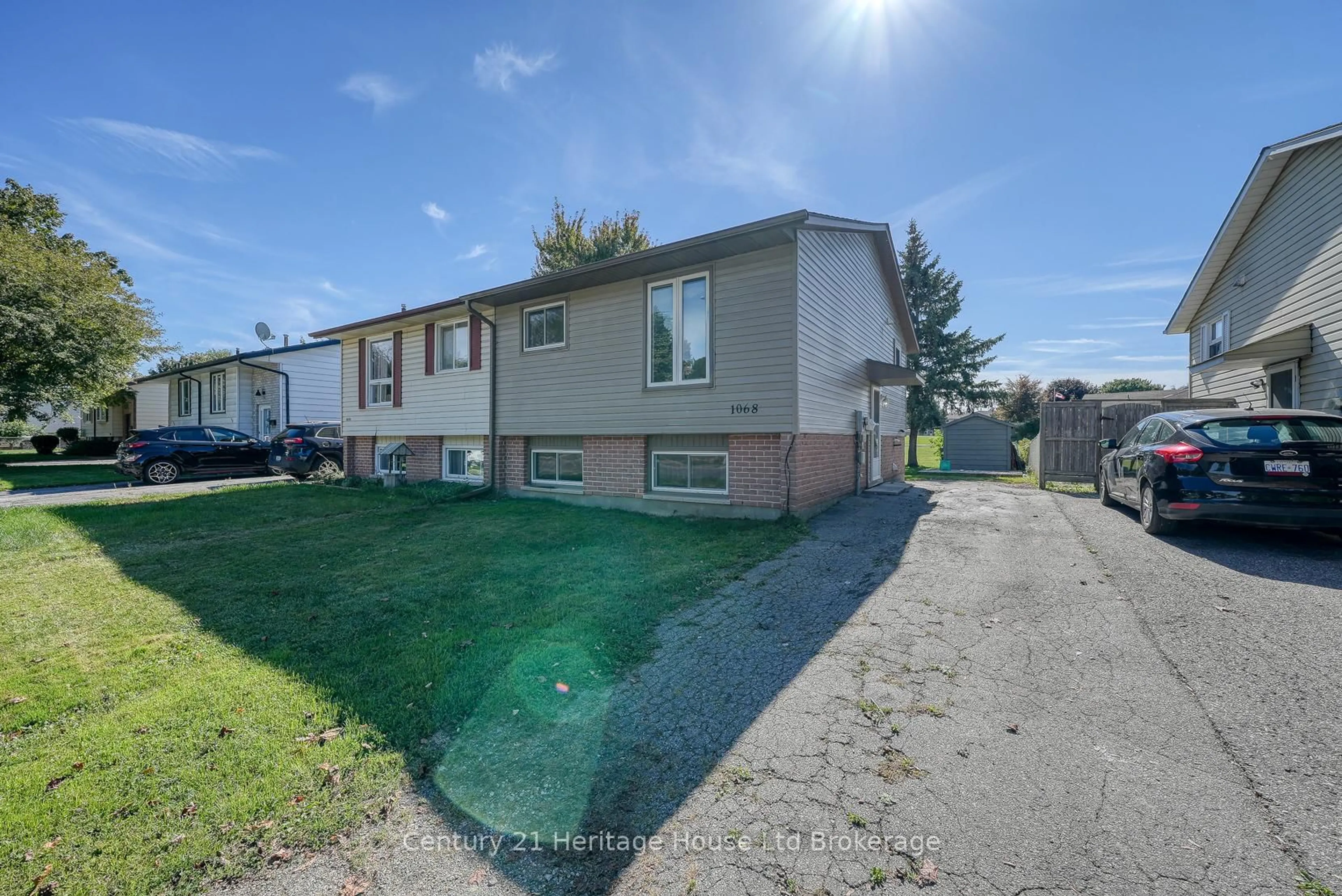 A pic from outside/outdoor area/front of a property/back of a property/a pic from drone, street for 1068 Cree Ave, Woodstock Ontario N4T 1A2