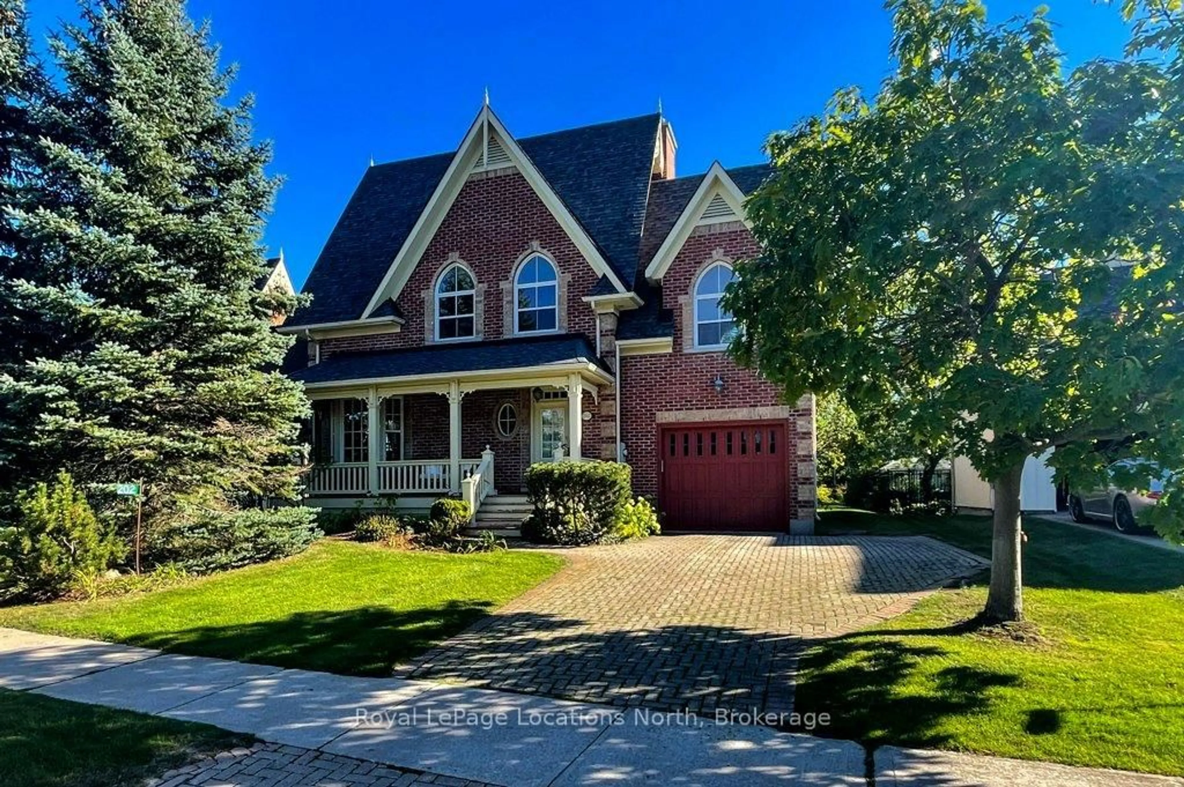 Home with brick exterior material, street for 202 Snowbridge Way, Blue Mountains Ontario L9Y 0V1