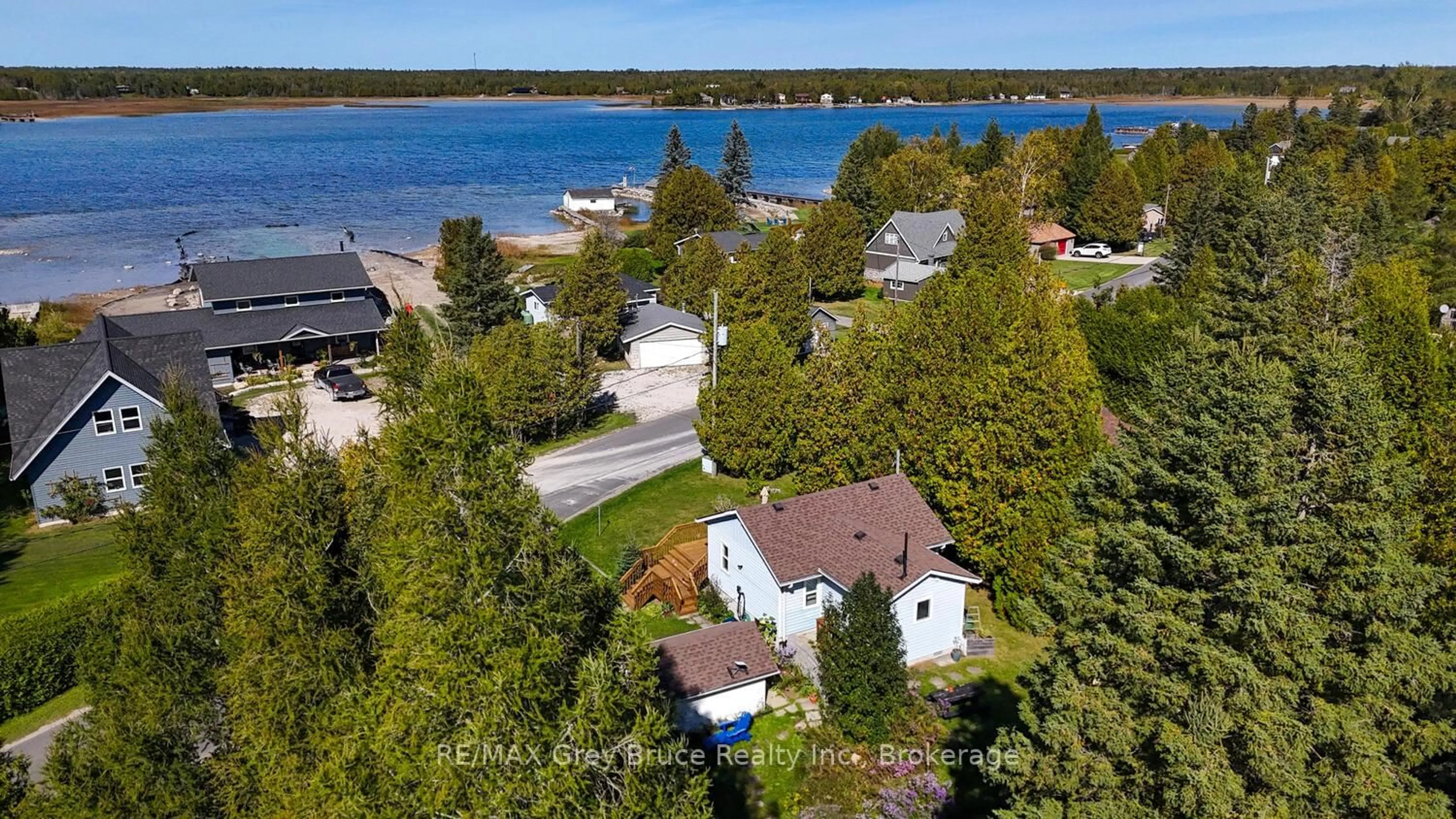 A pic from outside/outdoor area/front of a property/back of a property/a pic from drone, water/lake/river/ocean view for 861 Pike Bay Rd, Northern Bruce Peninsula Ontario N0H 2T0