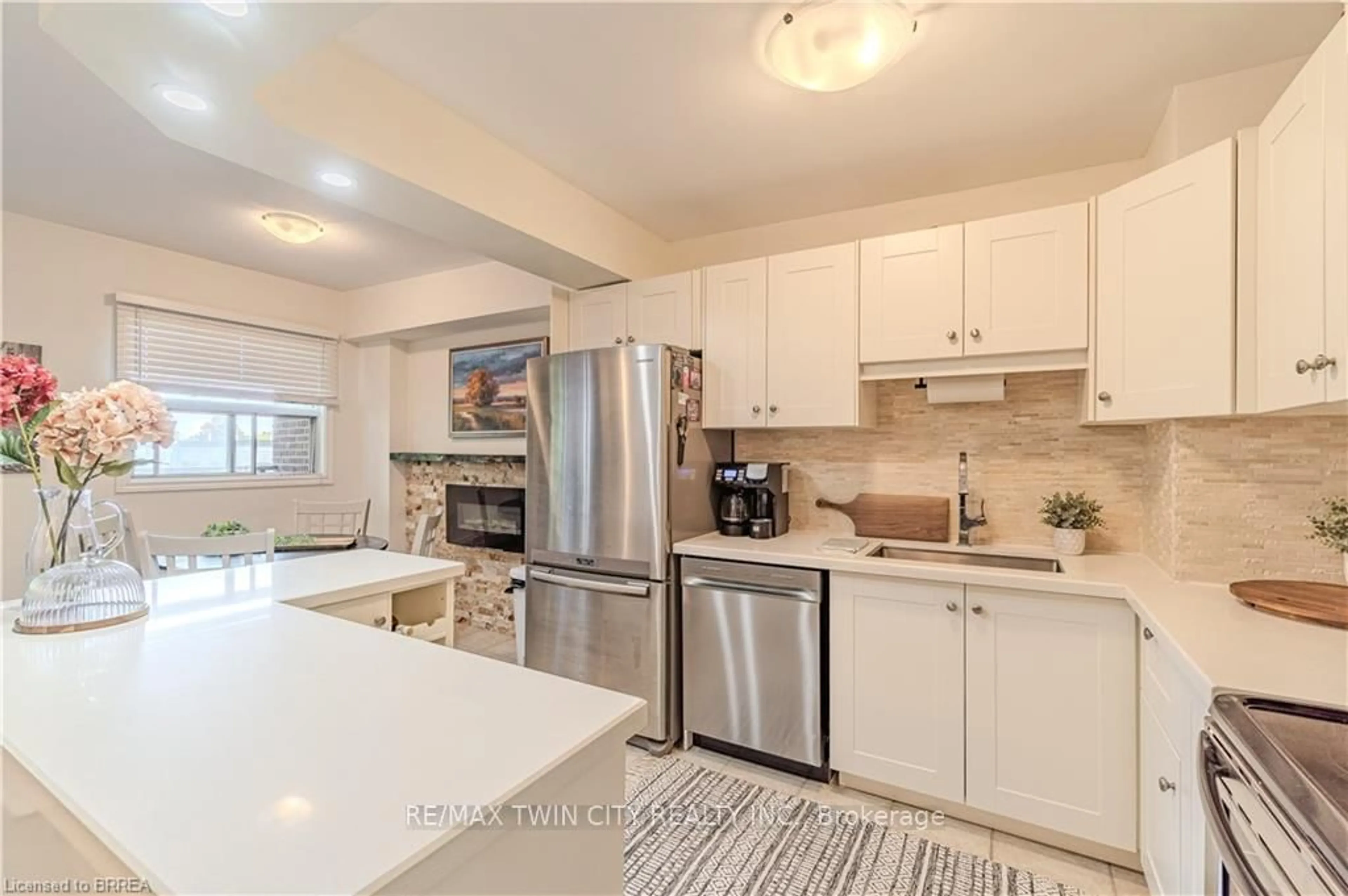 Open concept kitchen, ceramic/tile floor for 648 Grey St #305, Brantford Ontario N3S 4Y3