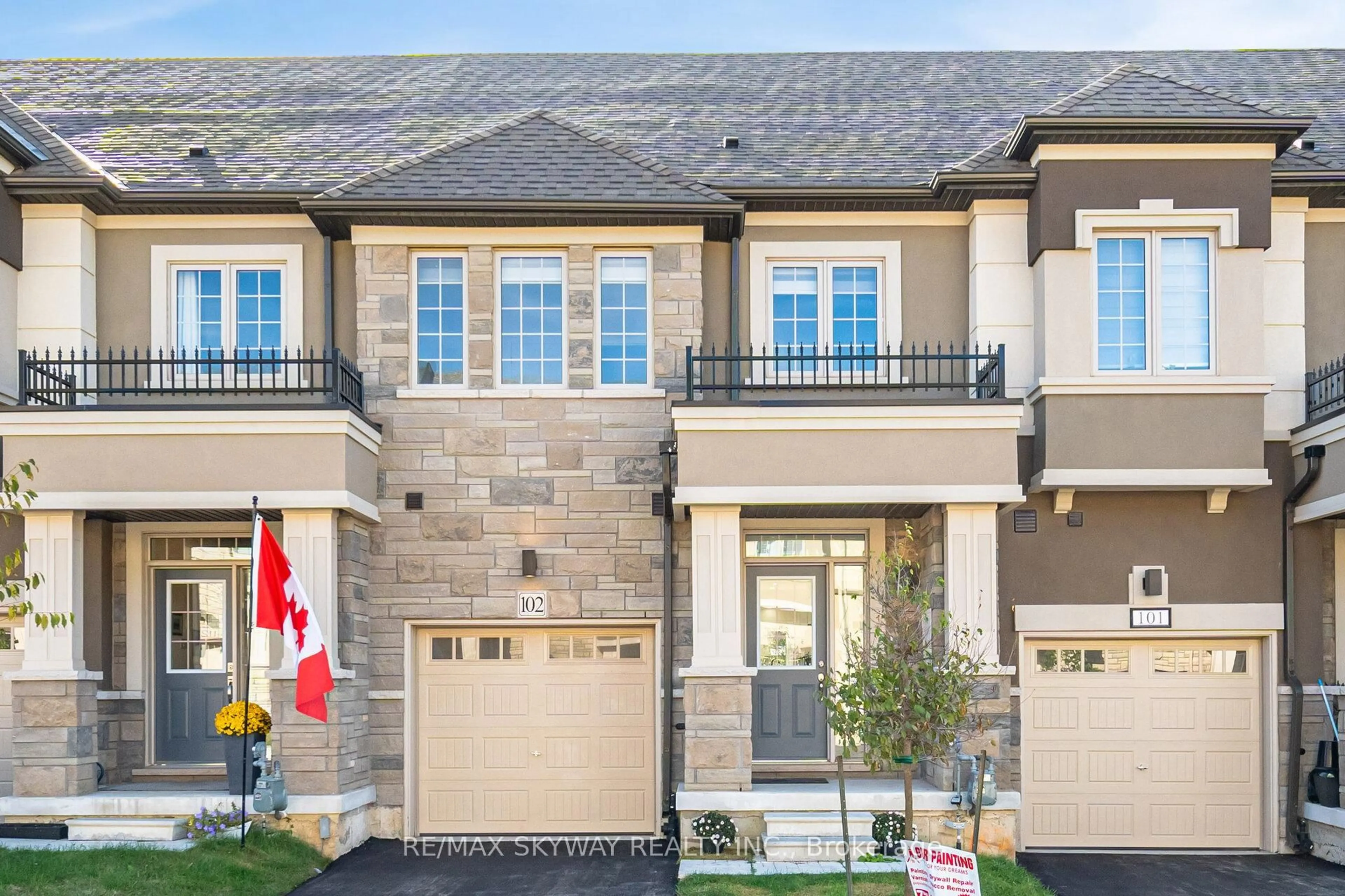 Home with brick exterior material, street for 305 Garner Rd #102, Hamilton Ontario L9G 5E6