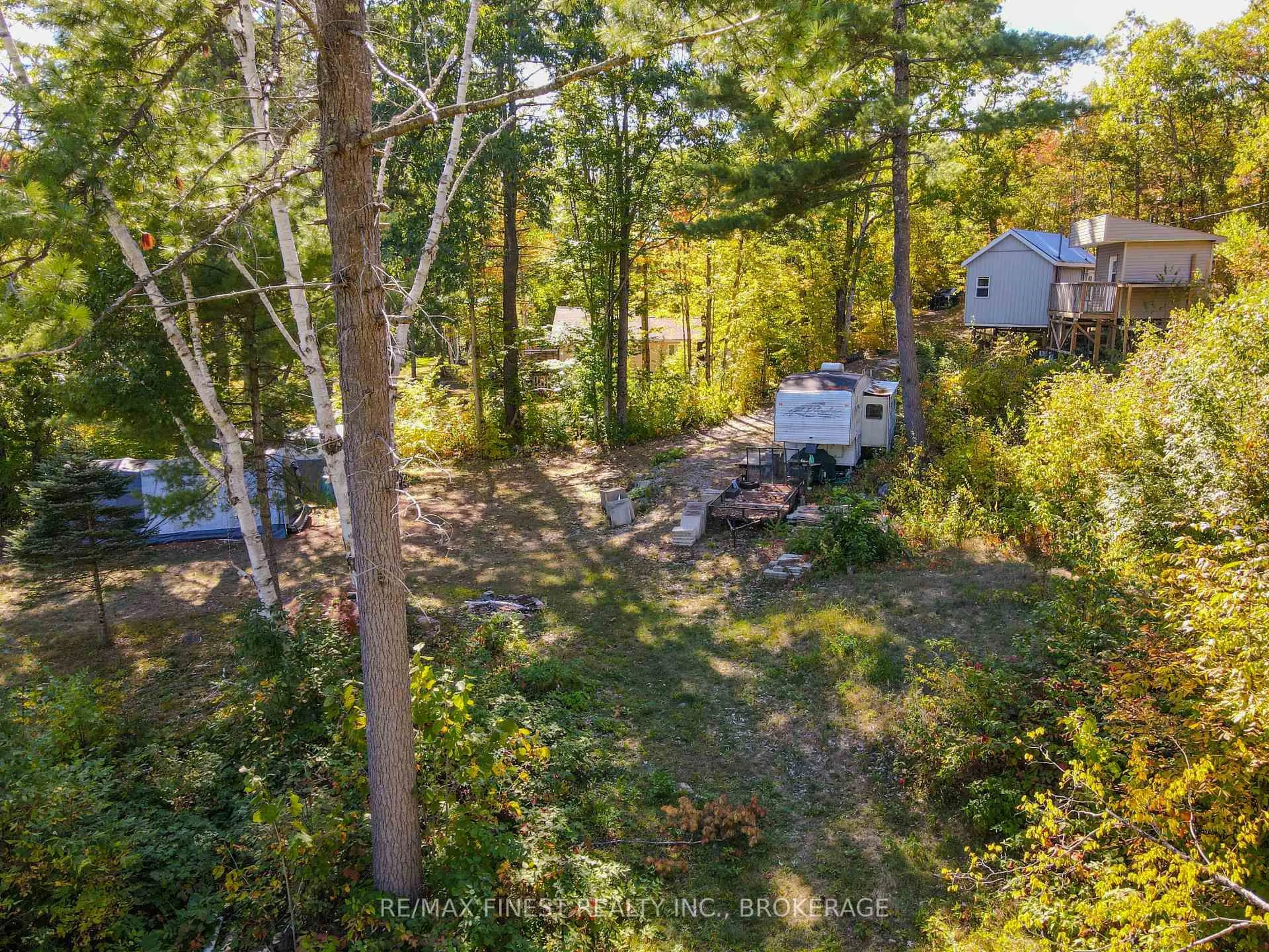 A pic from outside/outdoor area/front of a property/back of a property/a pic from drone, forest/trees view for 1097 Big Bay Dr, Arden Ontario K0H 1B0