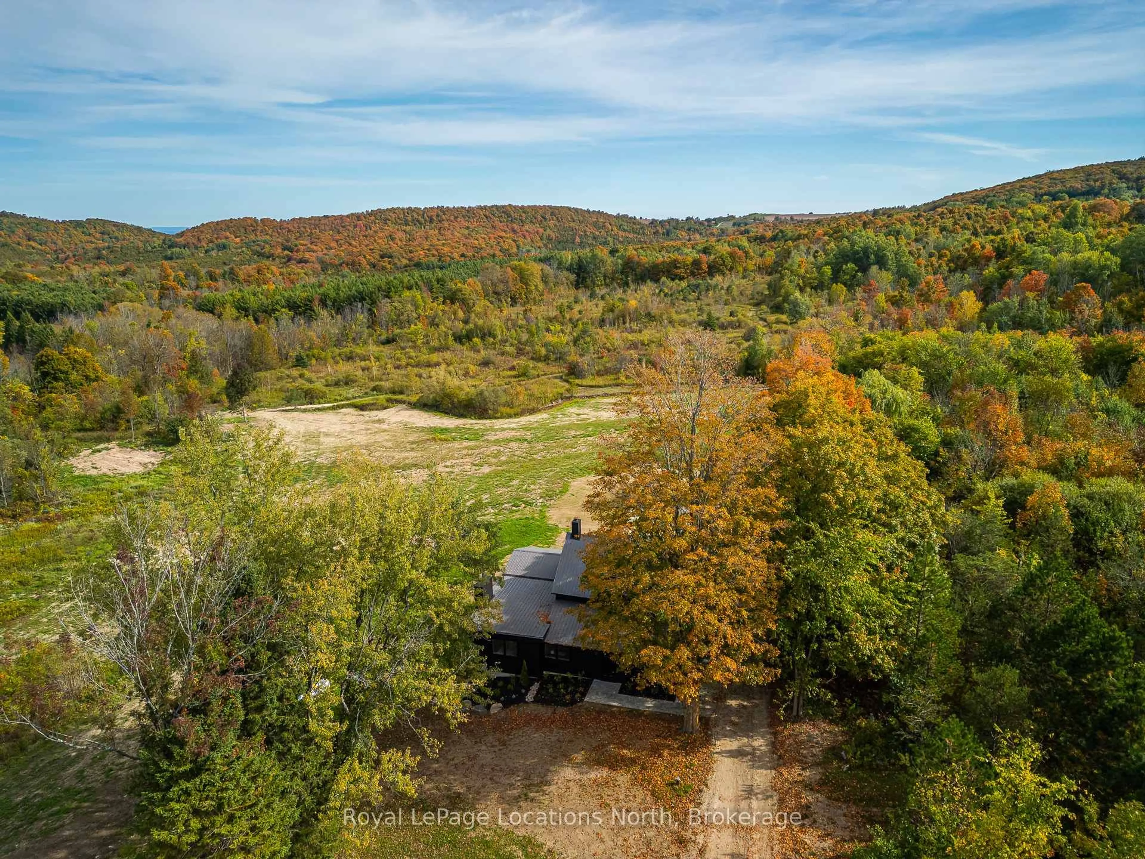 A pic from outside/outdoor area/front of a property/back of a property/a pic from drone, forest/trees view for 635019 Pretty River Rd, Blue Mountains Ontario L0M 1P0