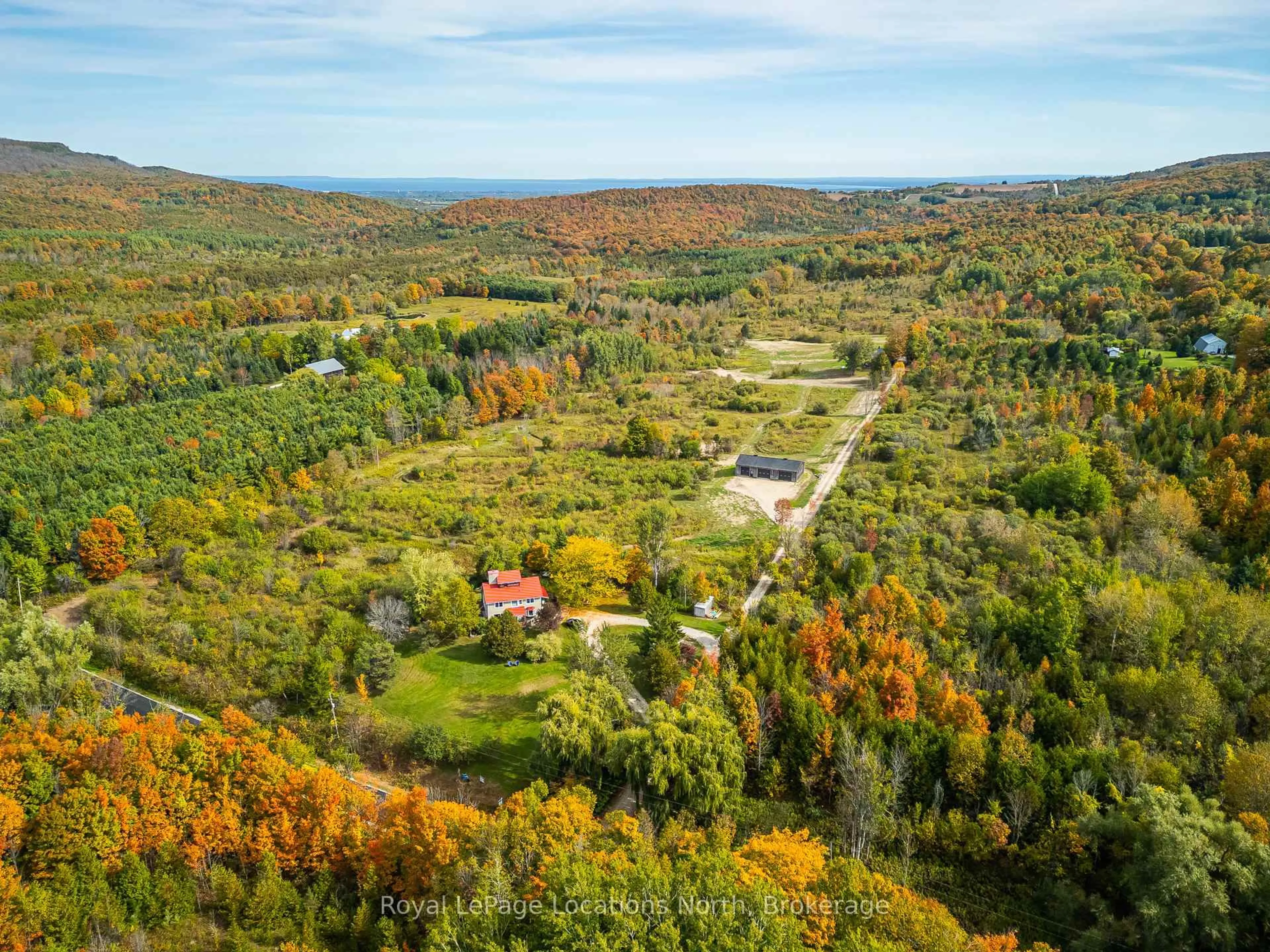 A pic from outside/outdoor area/front of a property/back of a property/a pic from drone, forest/trees view for 635019 Pretty River Rd, Blue Mountains Ontario L0M 1P0