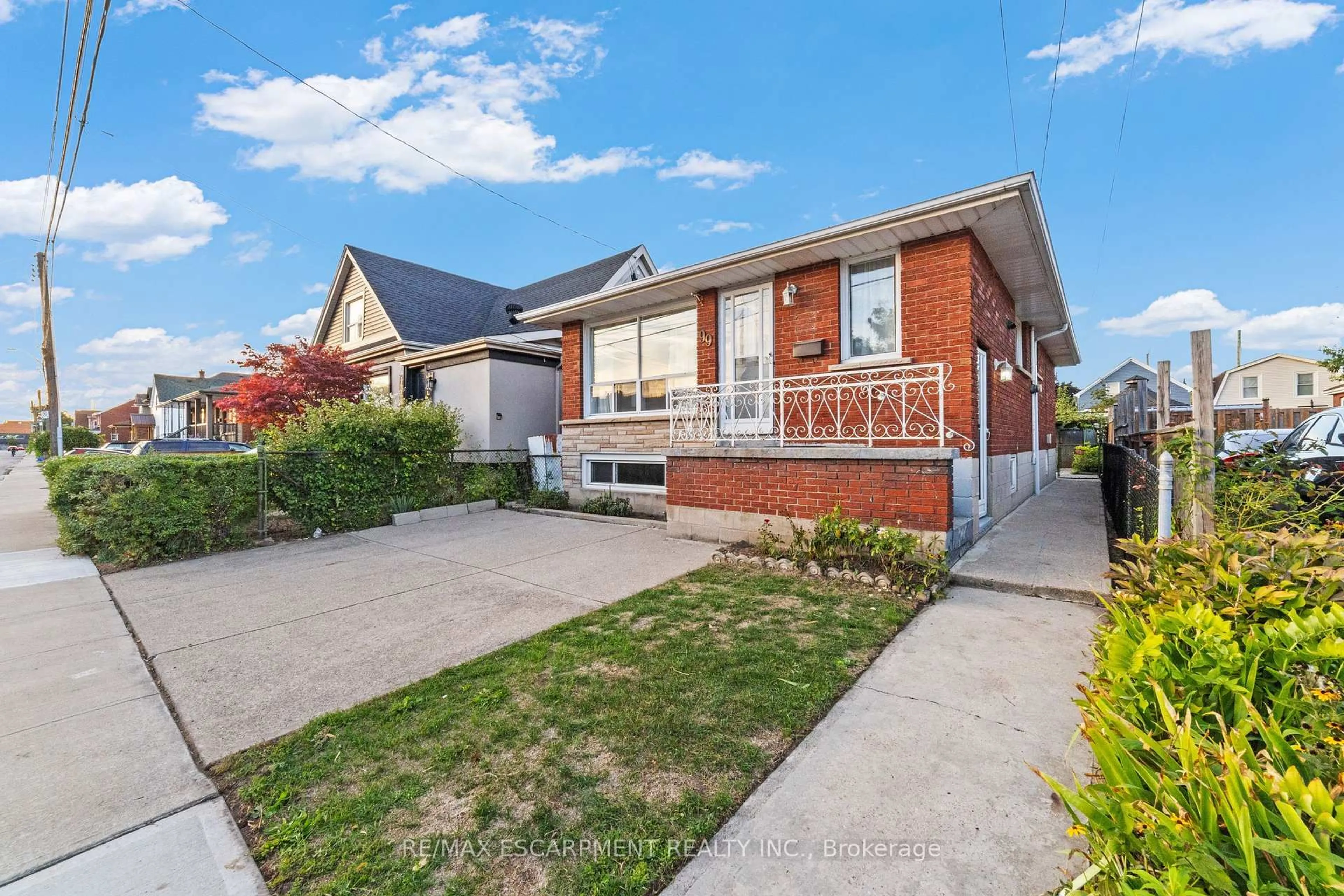 Home with brick exterior material, street for 99 Edinburgh Ave, Hamilton Ontario L8H 2C6
