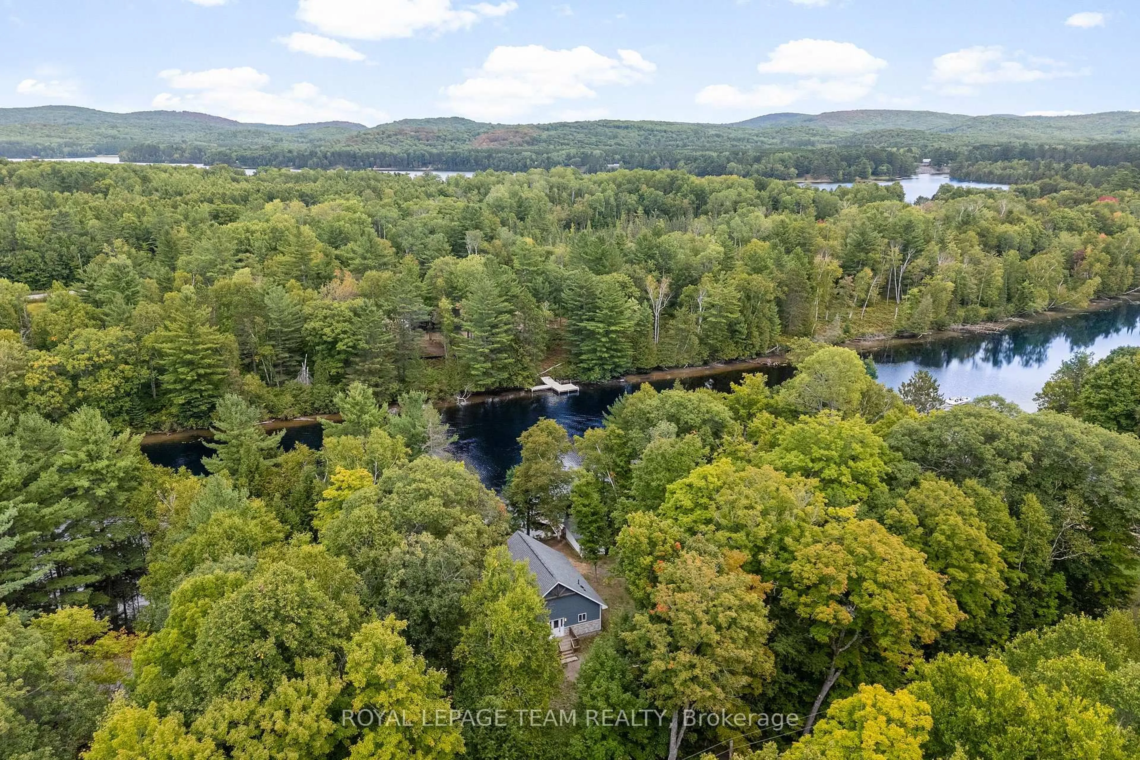 A pic from outside/outdoor area/front of a property/back of a property/a pic from drone, water/lake/river/ocean view for 664 Ohio Rd, Combermere Ontario K0J 1L0