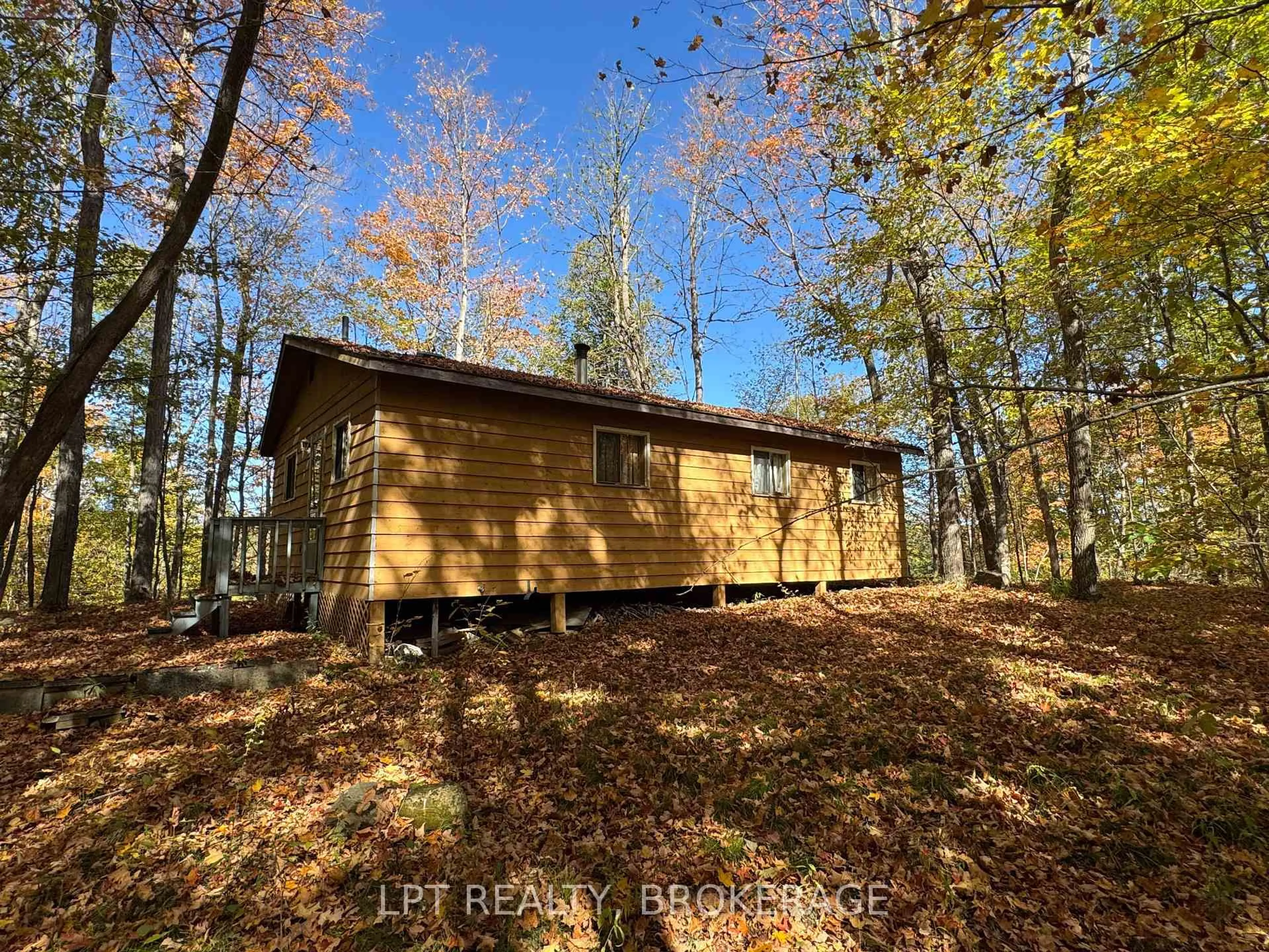 A pic from outside/outdoor area/front of a property/back of a property/a pic from drone, forest/trees view for 500 Yvon Lane, Rideau Lakes Ontario K0G 1X0