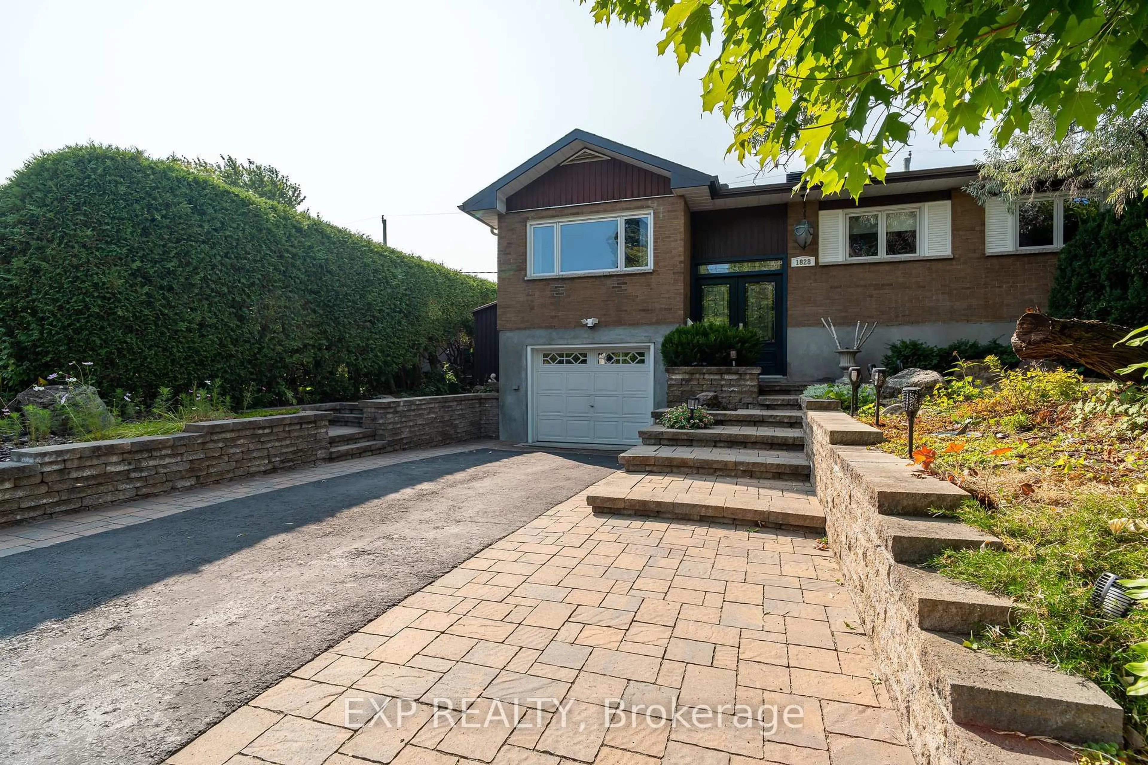 Home with brick exterior material, street for 1828 Lorraine Ave, Ottawa Ontario K1H 6Z8