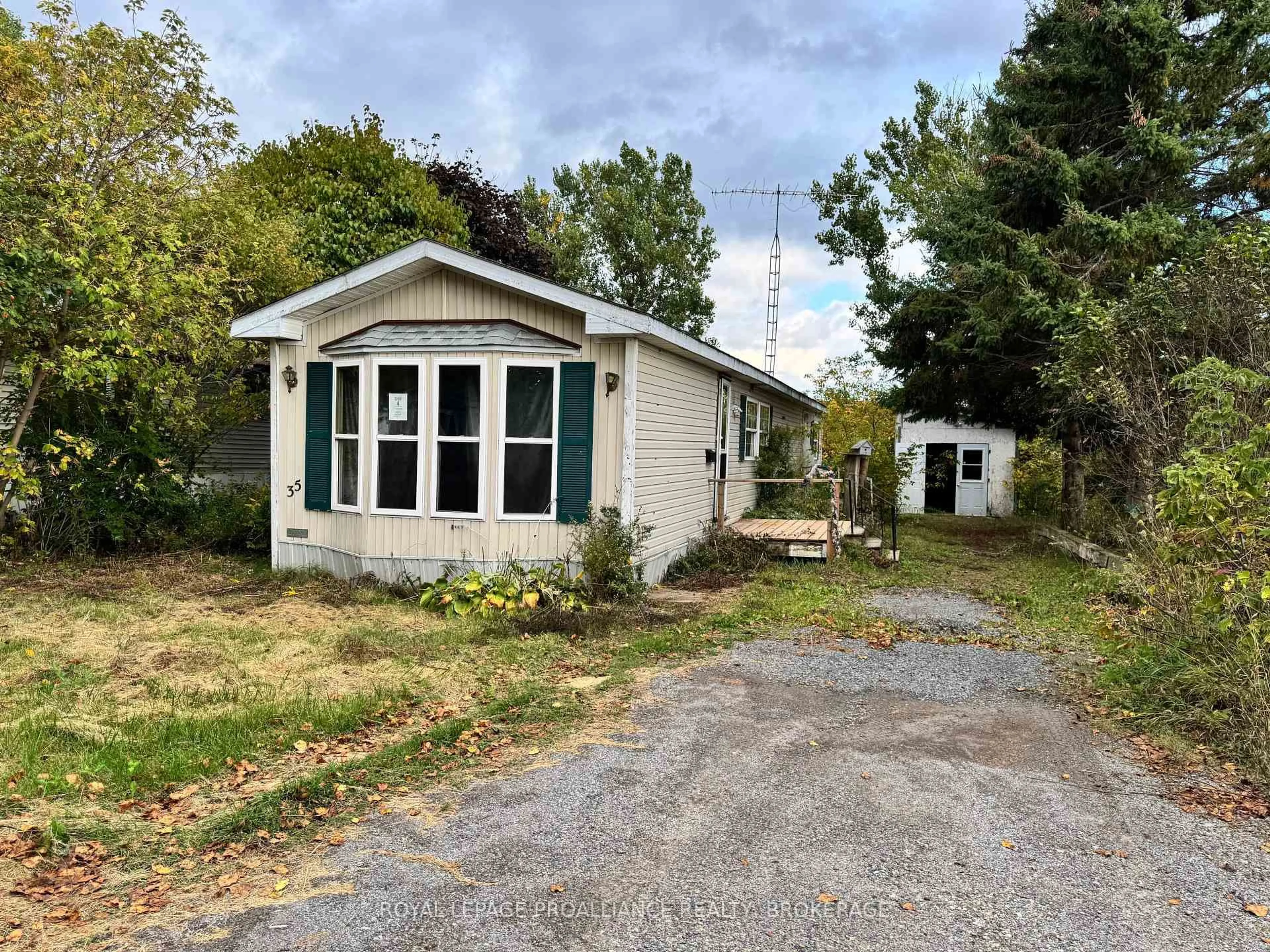 A pic from outside/outdoor area/front of a property/back of a property/a pic from drone, street for 227 Big Hill Rd #35, Leeds and the Thousand Islands Ontario K0H 2N0