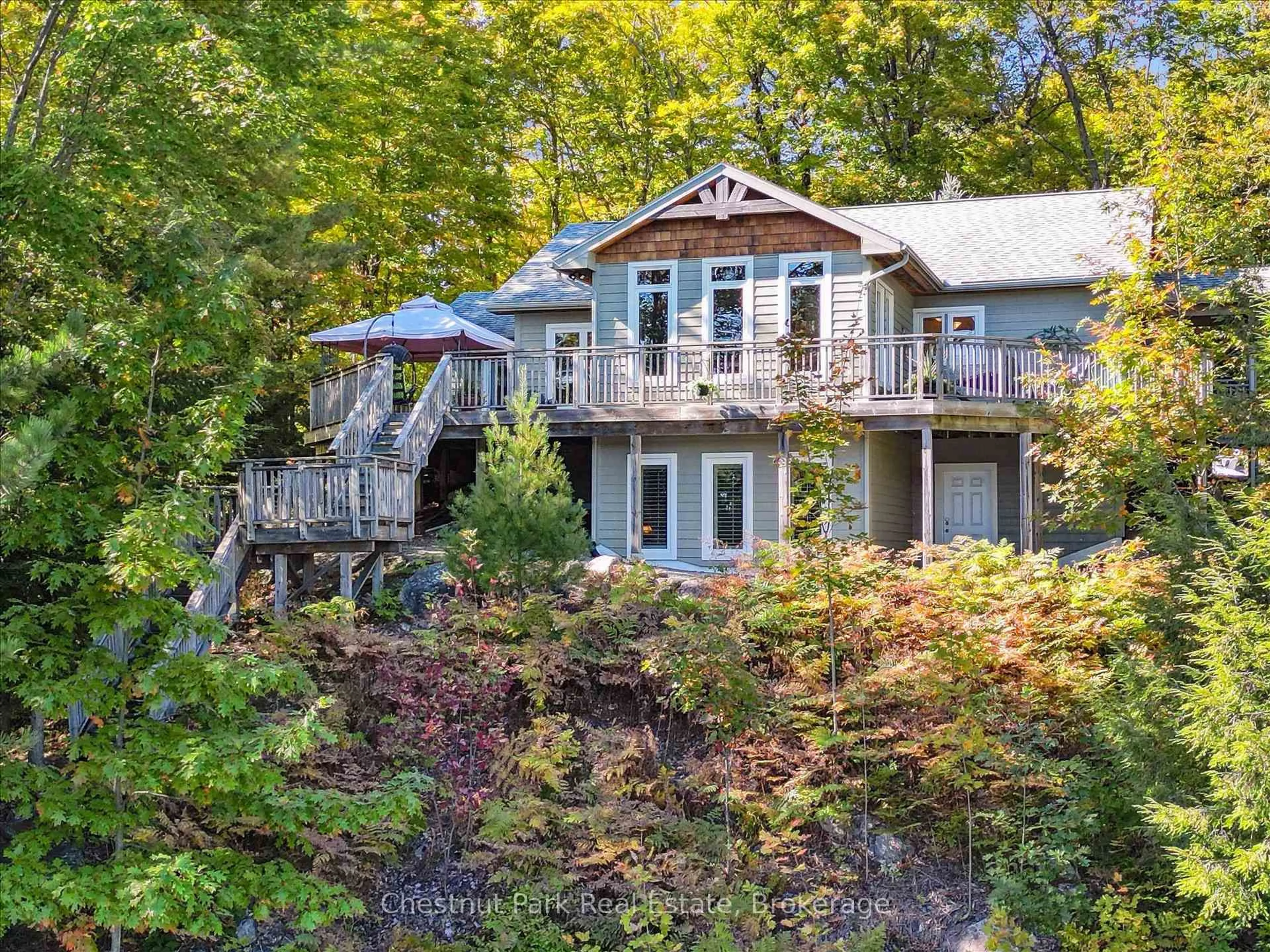 A pic from outside/outdoor area/front of a property/back of a property/a pic from drone, water/lake/river/ocean view for 1222 Hamill's Pt, Muskoka Lakes Ontario P0C 1H0