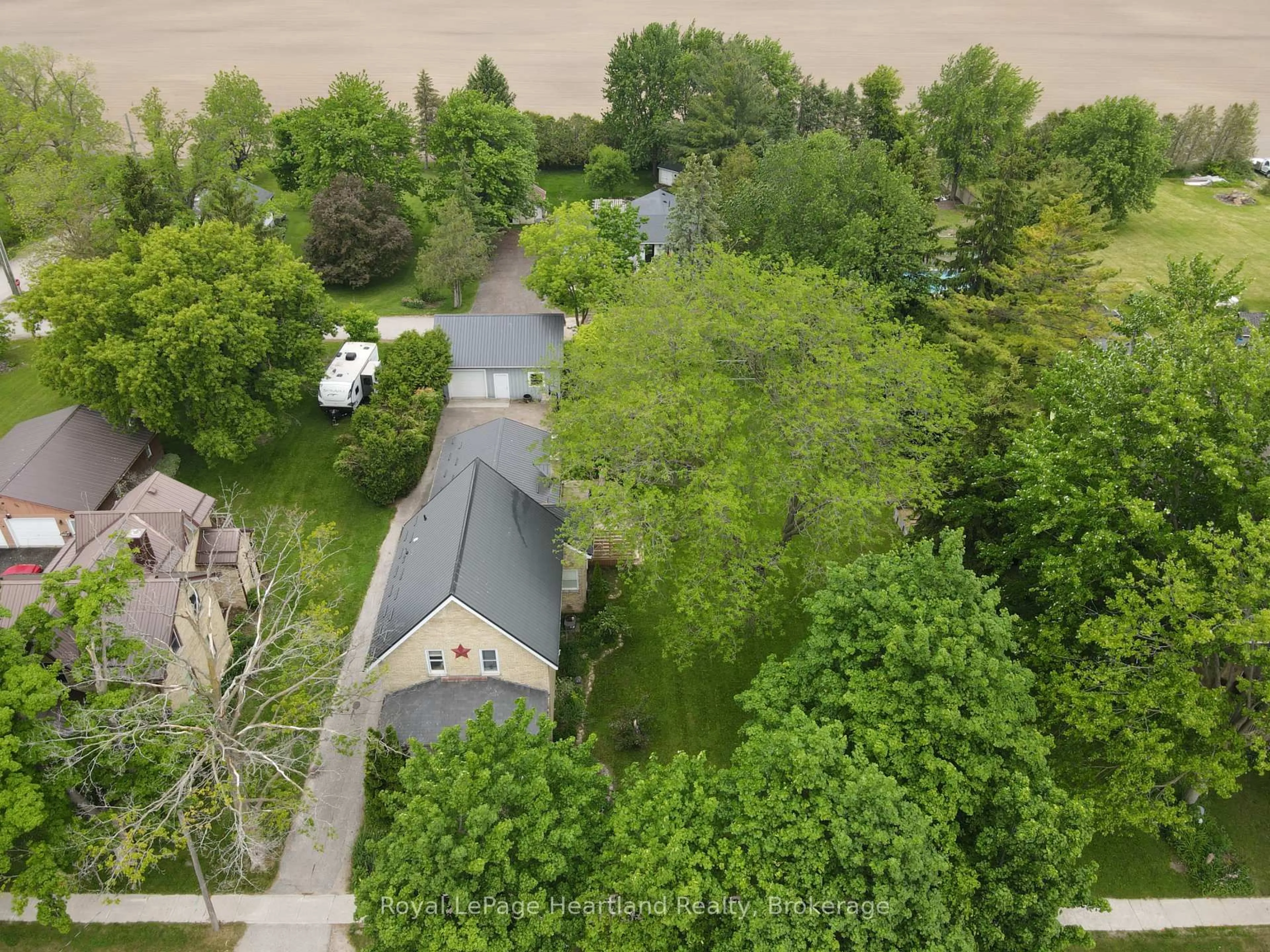 A pic from outside/outdoor area/front of a property/back of a property/a pic from drone, street for 78 Victoria Ave, South Huron Ontario N0M 1M0