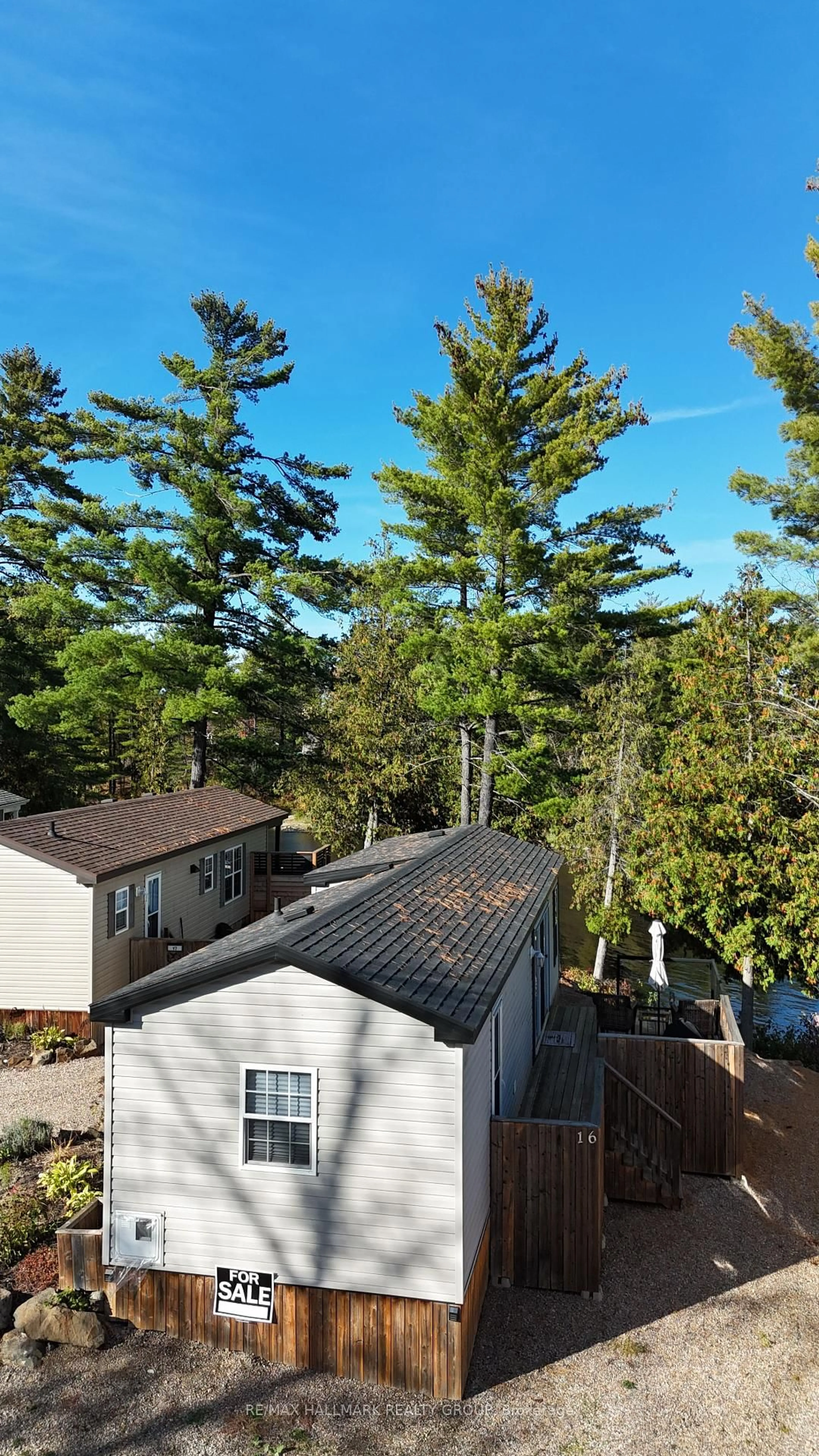 A pic from outside/outdoor area/front of a property/back of a property/a pic from drone, forest/trees view for 92 Bingham Dr #16, Renfrew Ontario K7V 3Z8