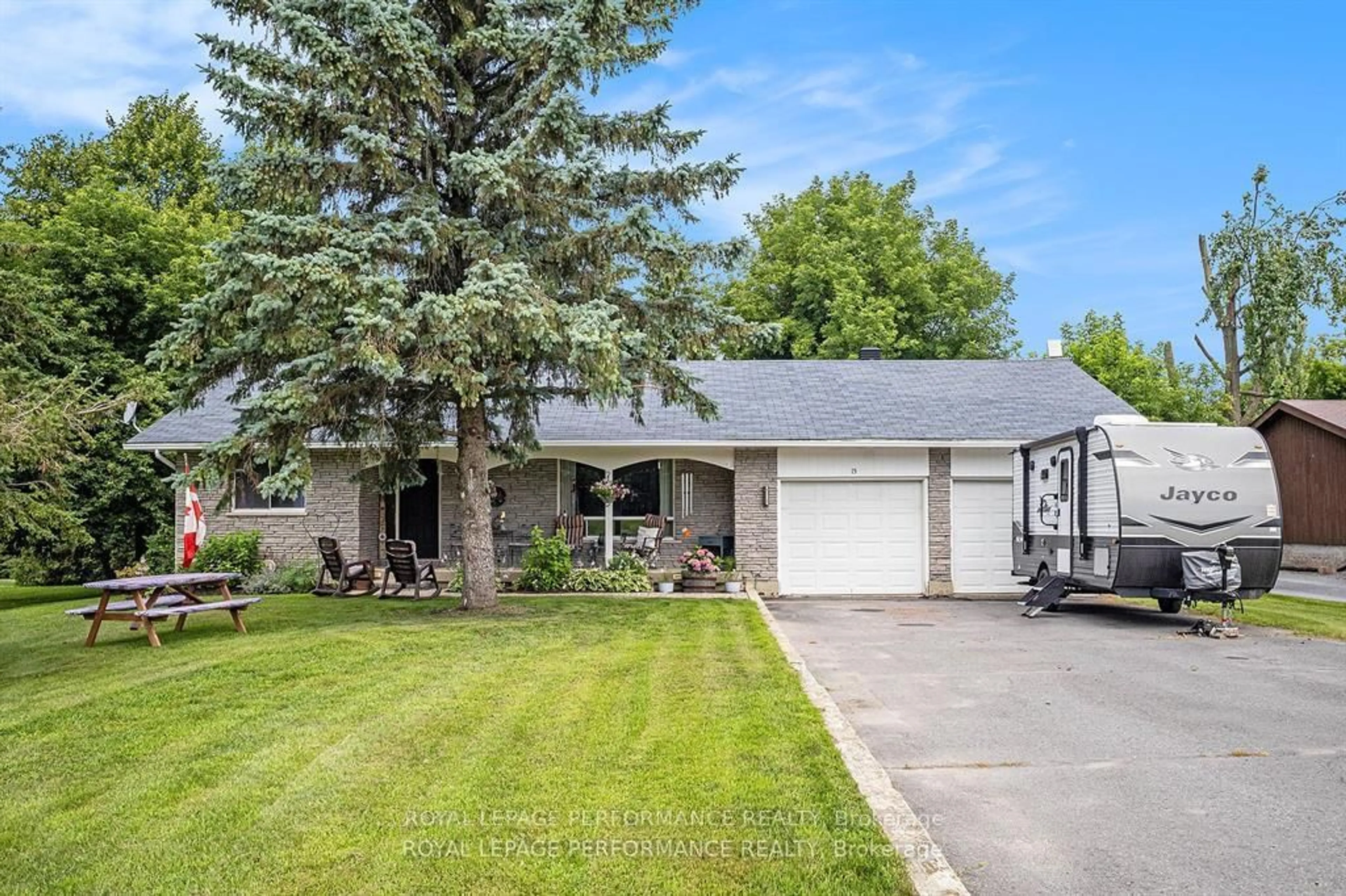 Home with vinyl exterior material, street for 15 Fair St, North Glengarry Ontario K0C 1T0