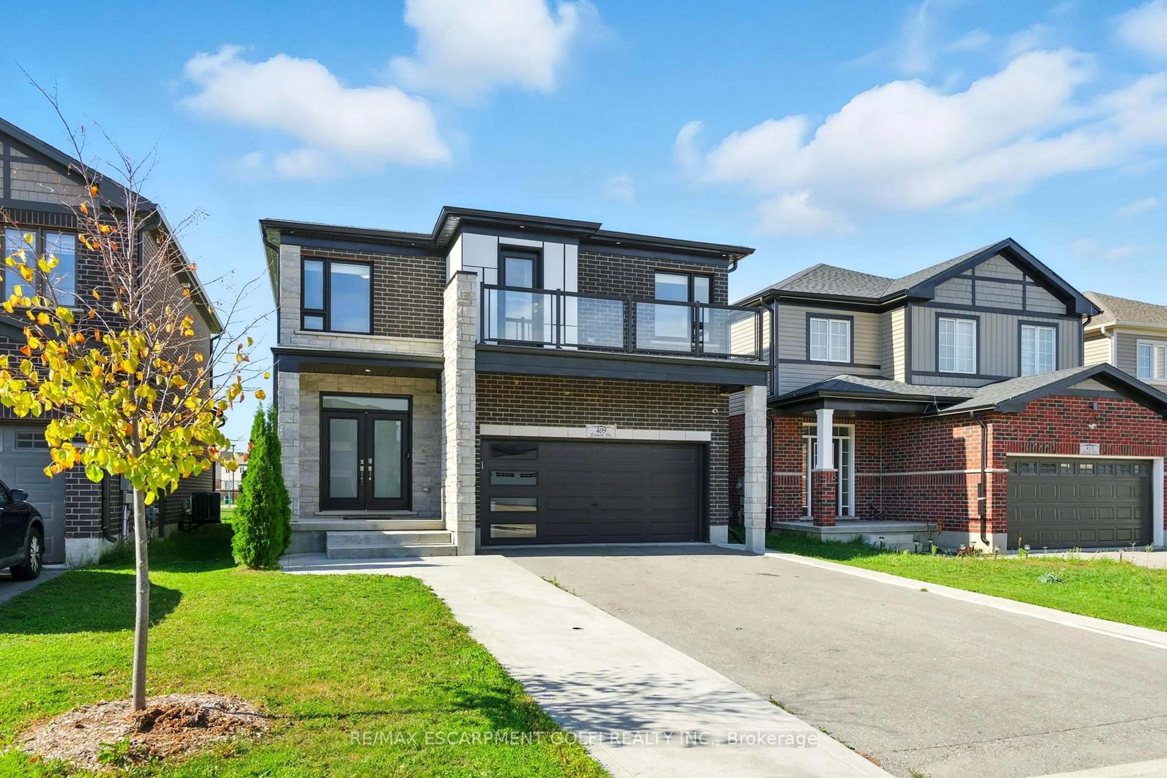 Home with brick exterior material, street for 409 Freure Dr, Cambridge Ontario N1S 0A2