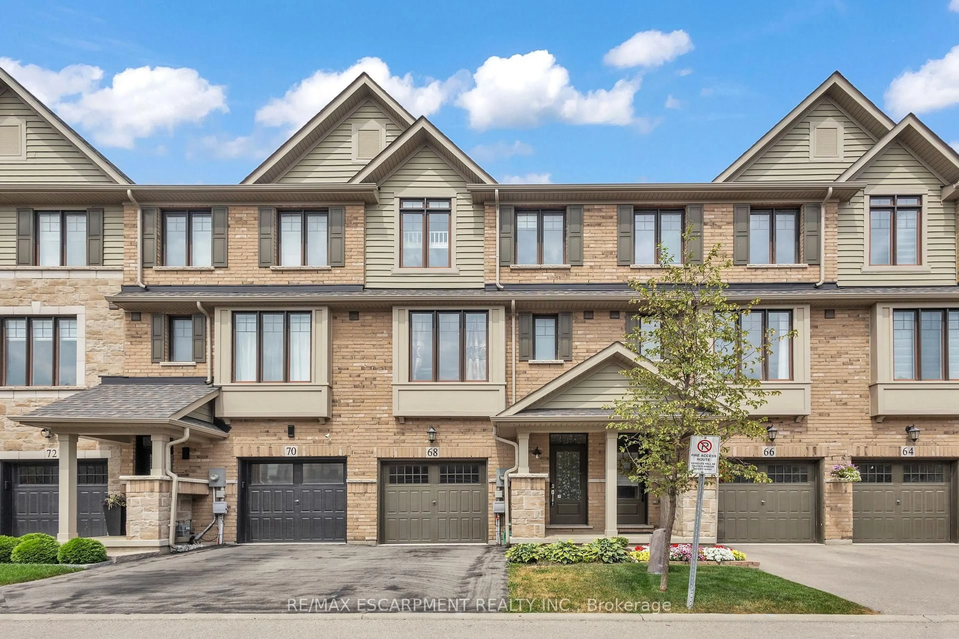 Home with brick exterior material, street for 68 Esplanade Lane, Grimsby Ontario L3M 0H2