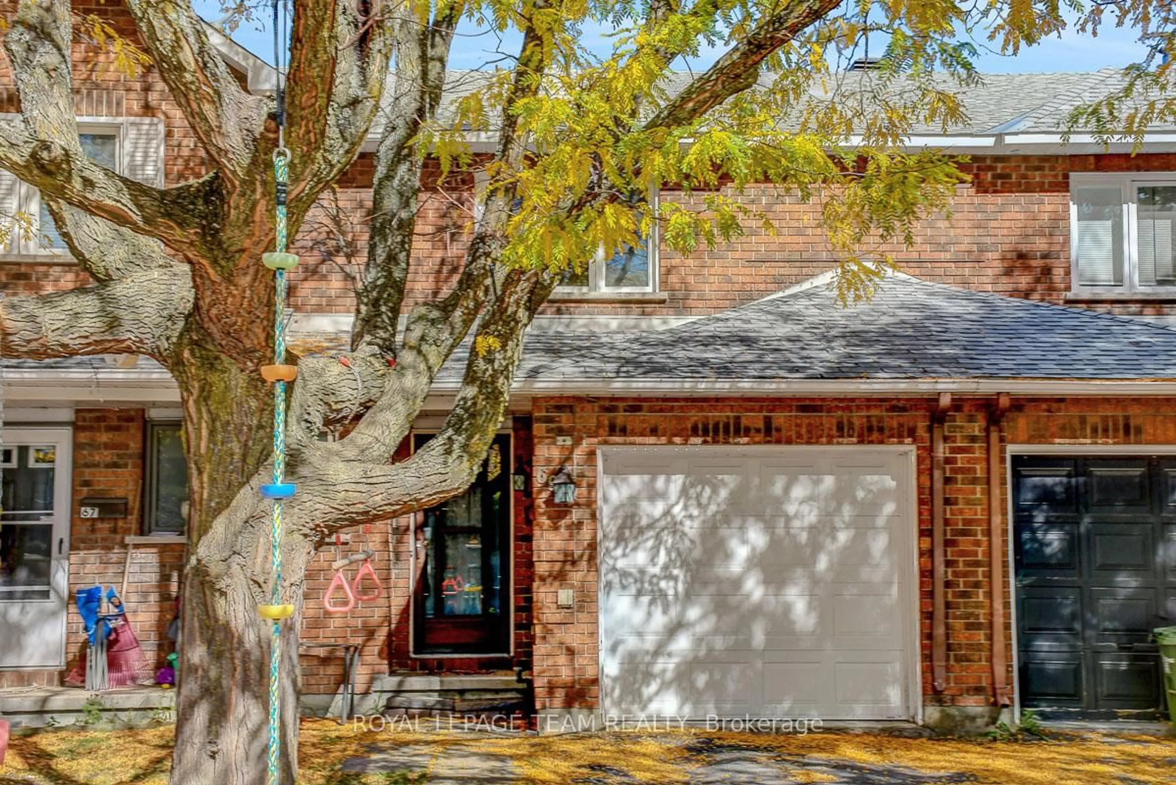 Home with brick exterior material, street for 69 Peterson Pl, Ottawa Ontario K2L 4A8