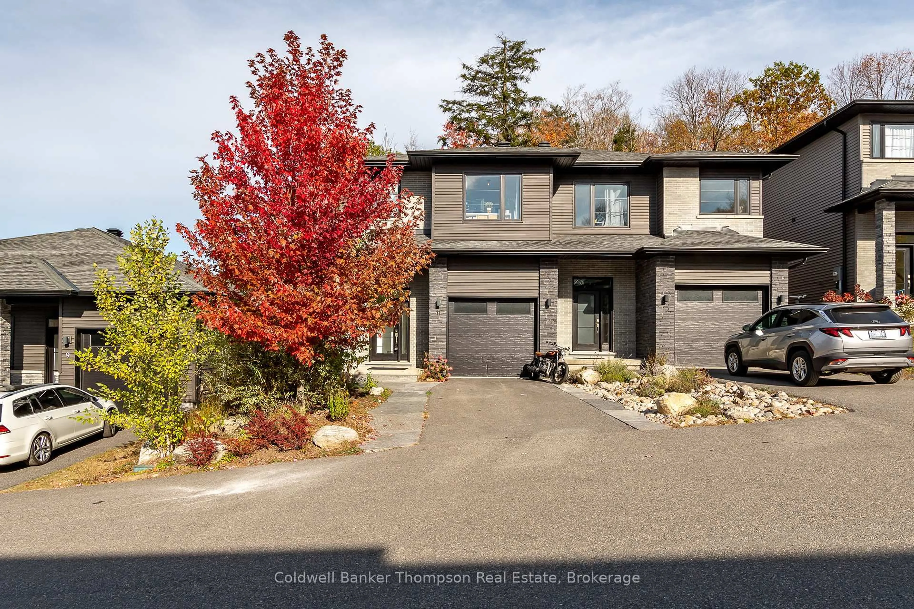 Home with brick exterior material, street for 11 Cascade Lane, Huntsville Ontario P1H 1Y3
