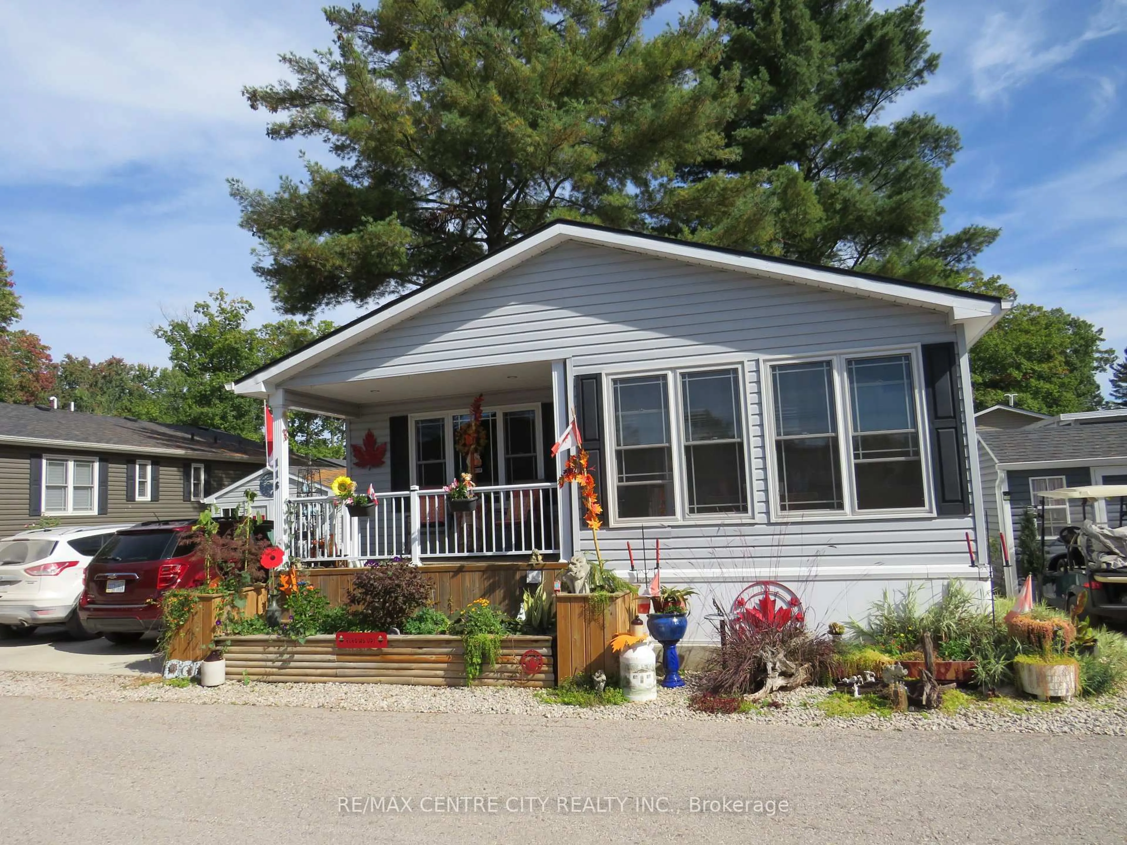 Home with vinyl exterior material, street for 22790 Amiens Rd #116, Middlesex Centre Ontario N0L 1R0