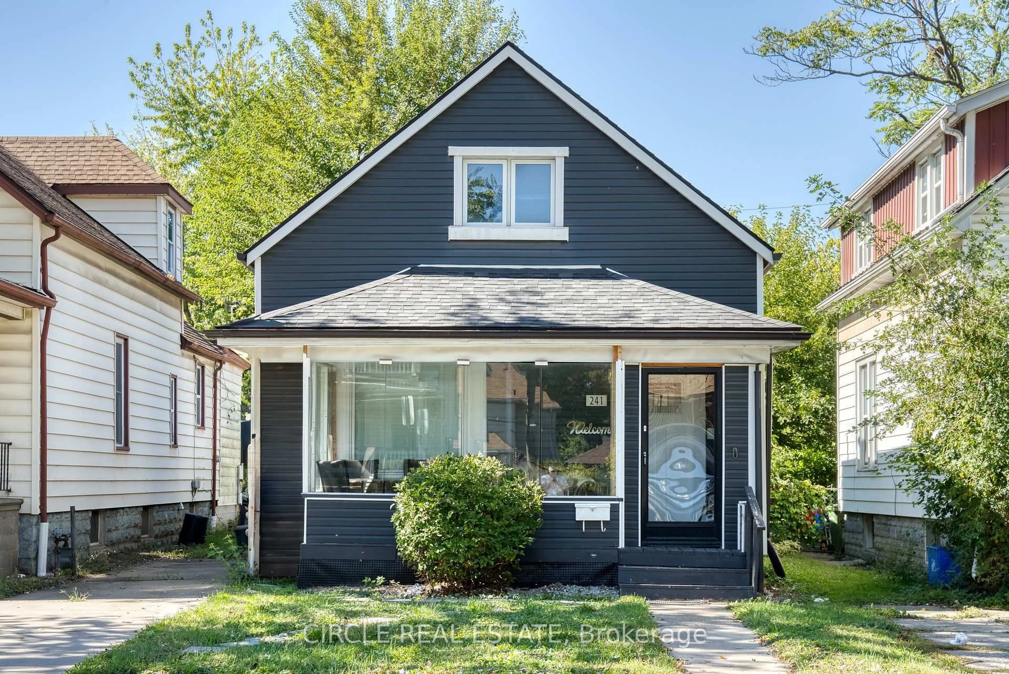 Home with vinyl exterior material, street for 241 Curry Ave, Windsor Ontario N9B 2B4