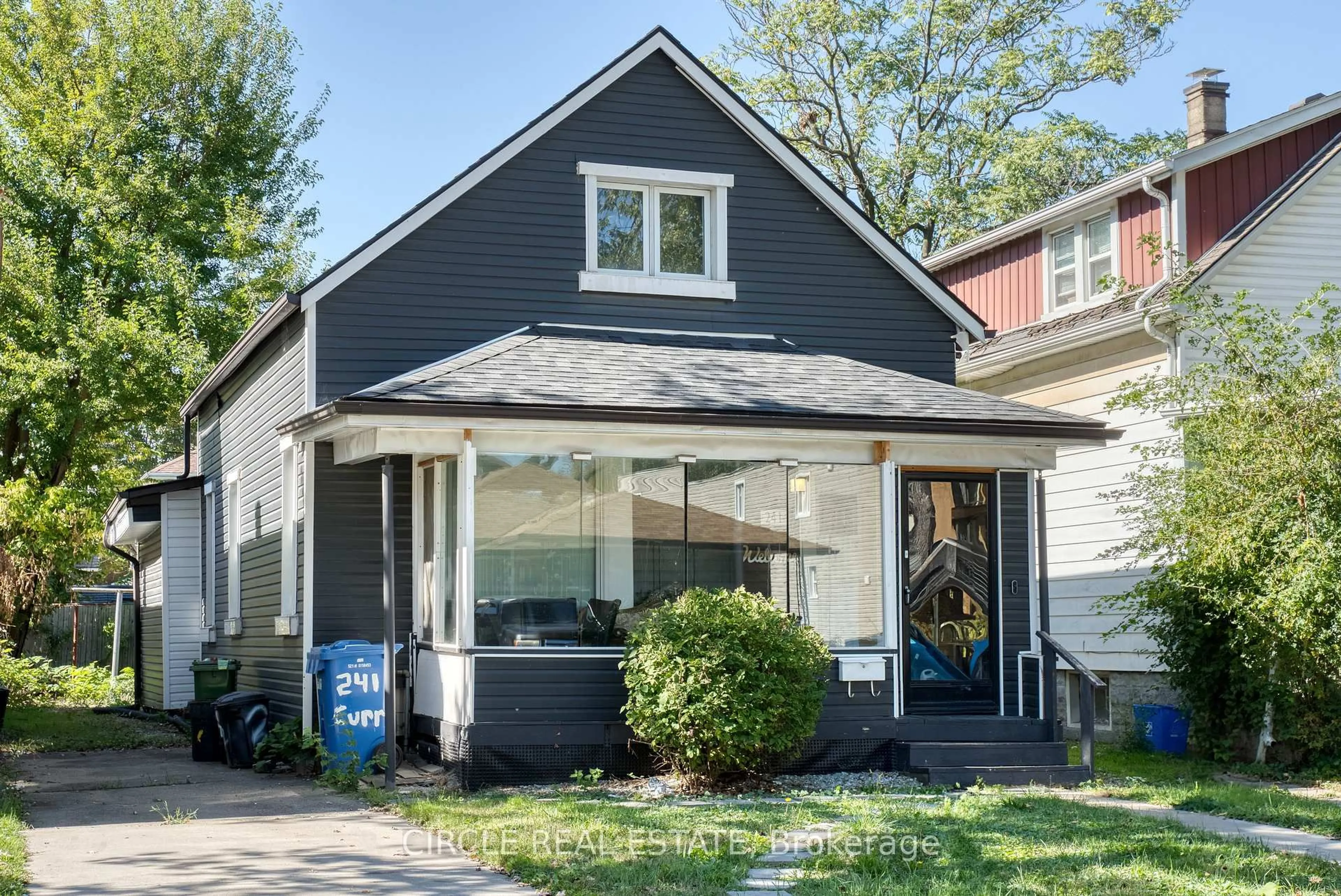 Home with vinyl exterior material, street for 241 Curry Ave, Windsor Ontario N9B 2B4