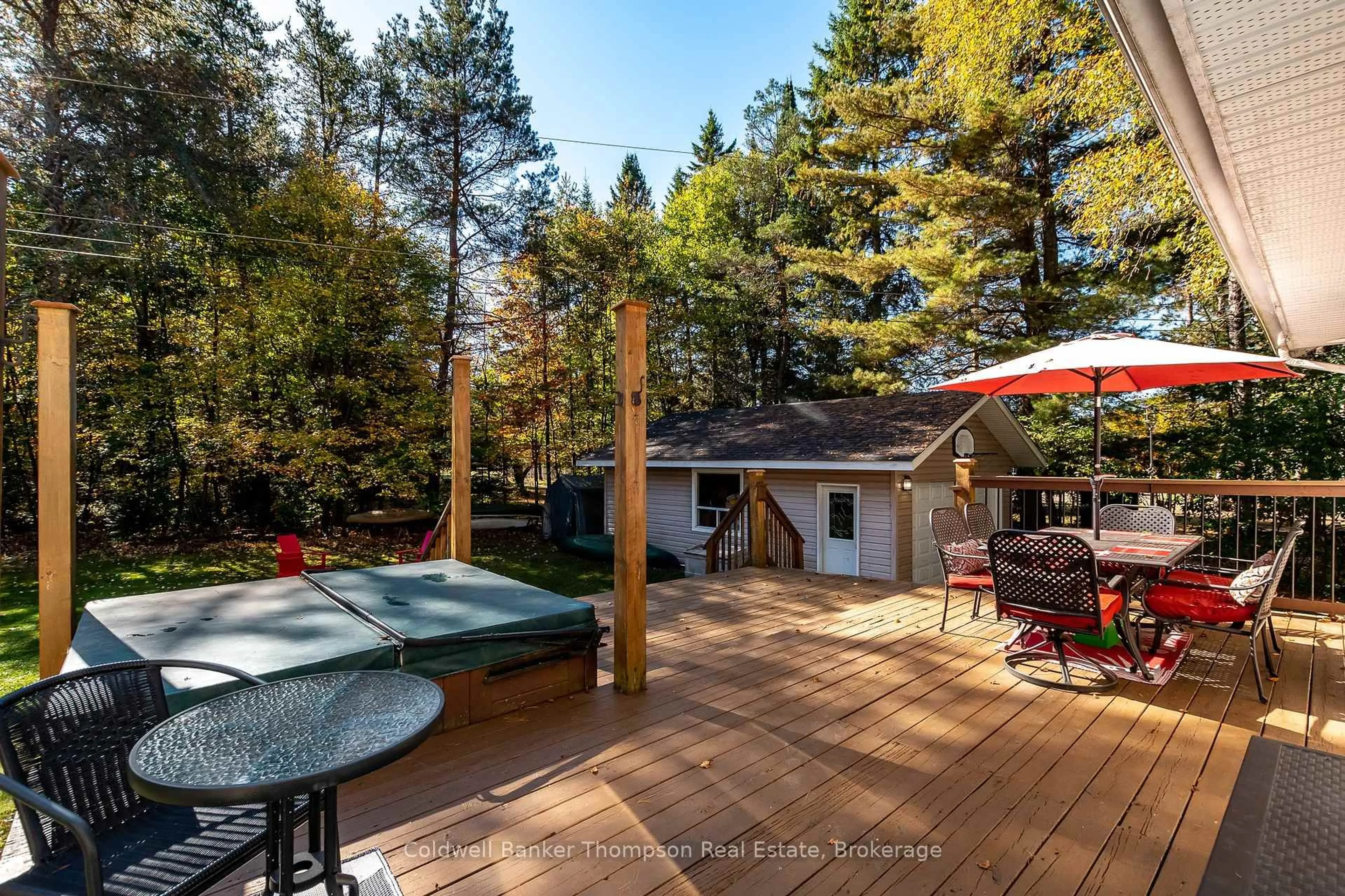 Patio, forest/trees view for 4237 Ravenscliffe Rd, Huntsville Ontario P1H 2J2