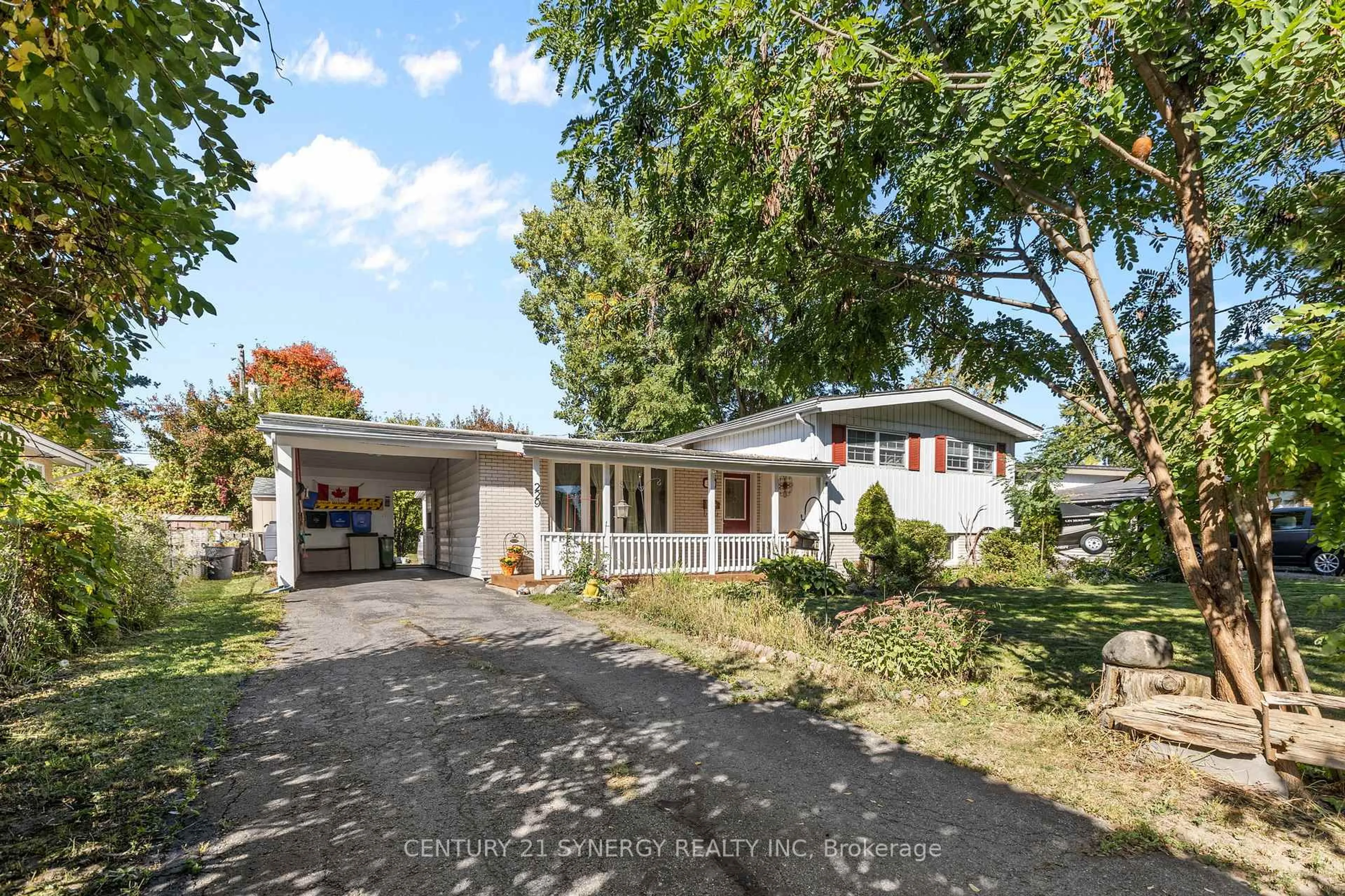 A pic from outside/outdoor area/front of a property/back of a property/a pic from drone, street for 229 Kennedy Lane, Ottawa Ontario K1E 1G5
