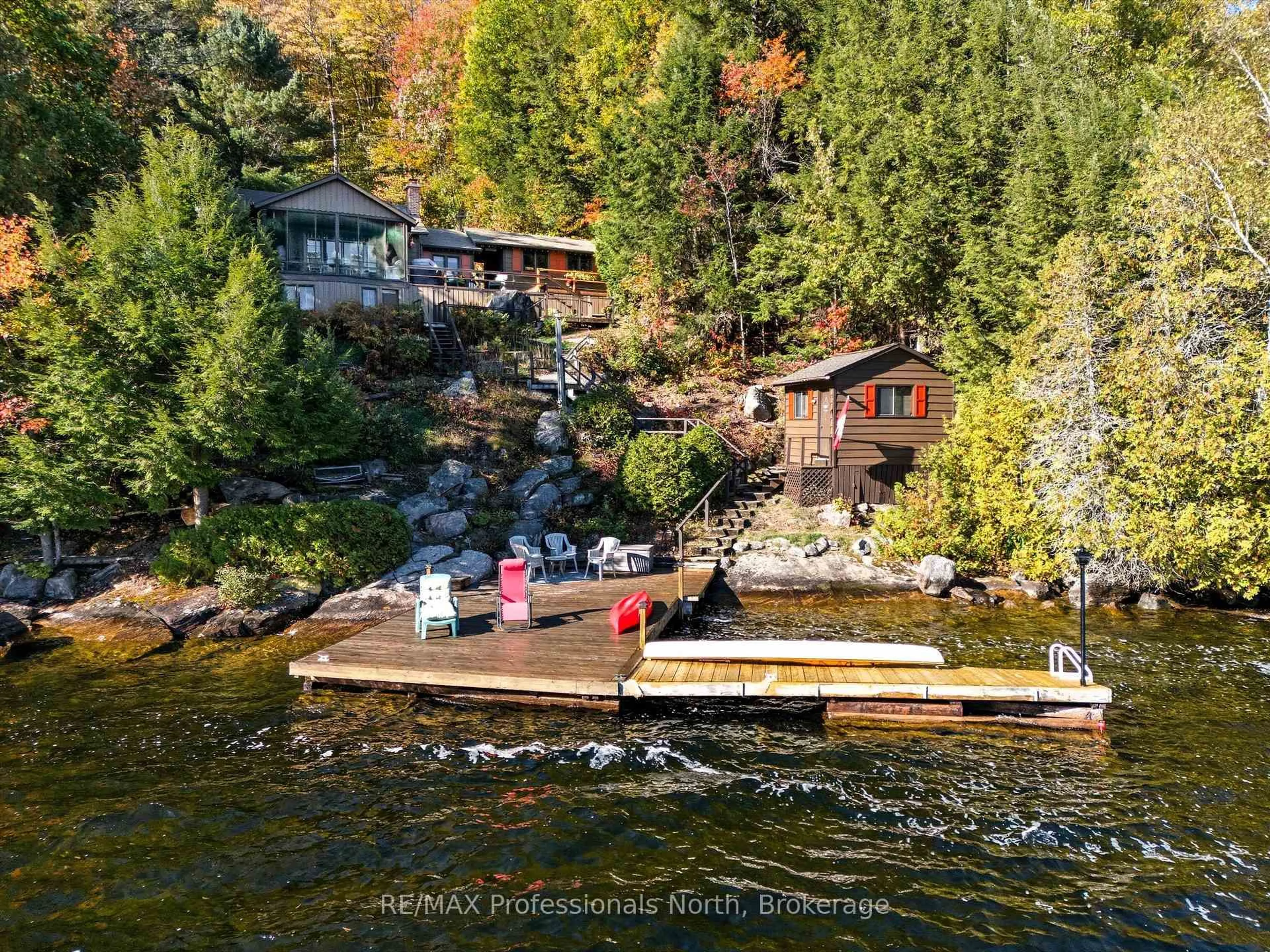 A pic from outside/outdoor area/front of a property/back of a property/a pic from drone, water/lake/river/ocean view for 1159 Schufelt Rd, Lake of Bays Ontario P0B 1A0