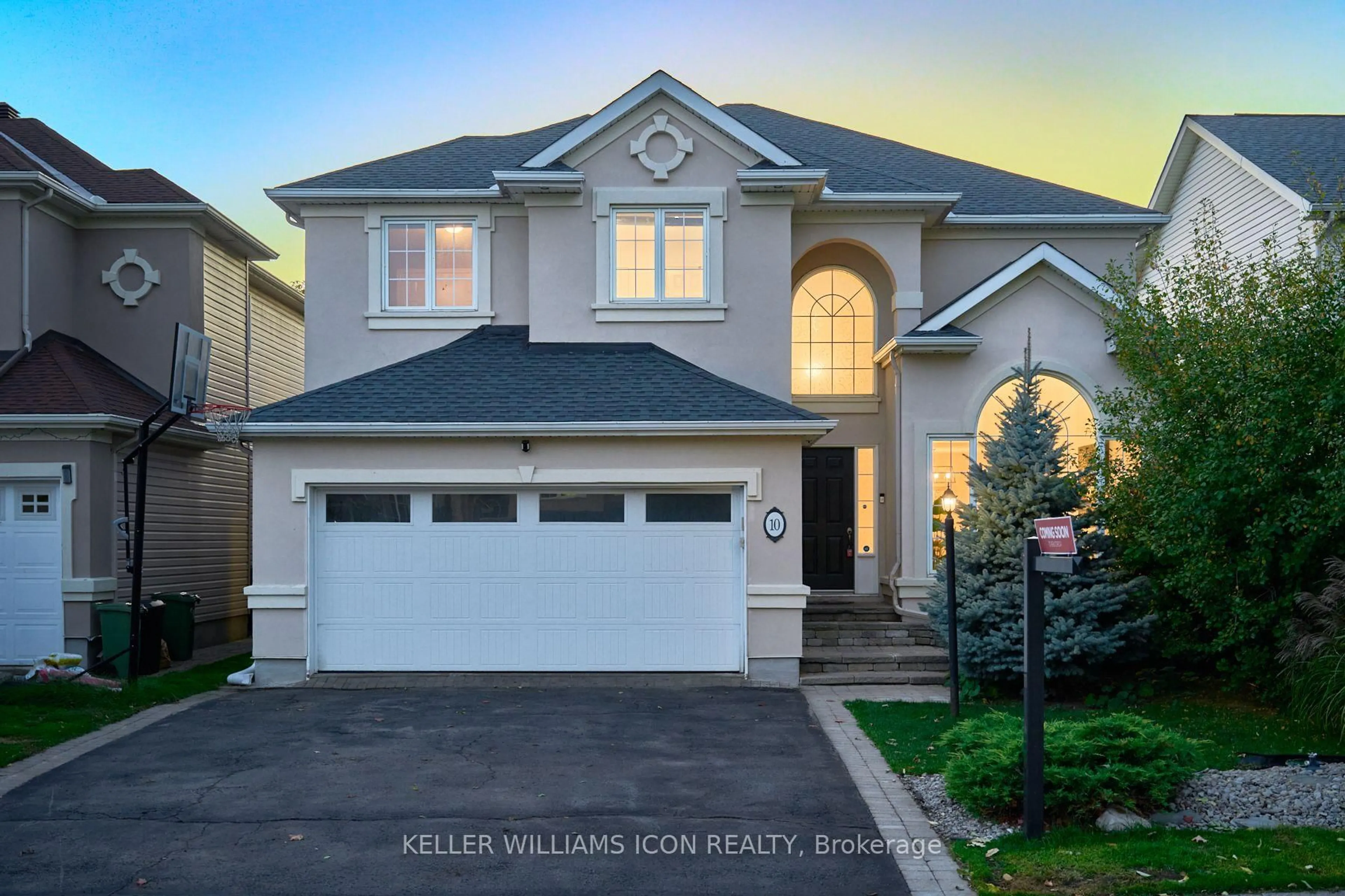 Home with vinyl exterior material, street for 10 Pondhollow Way, Ottawa Ontario K2J 4Y4