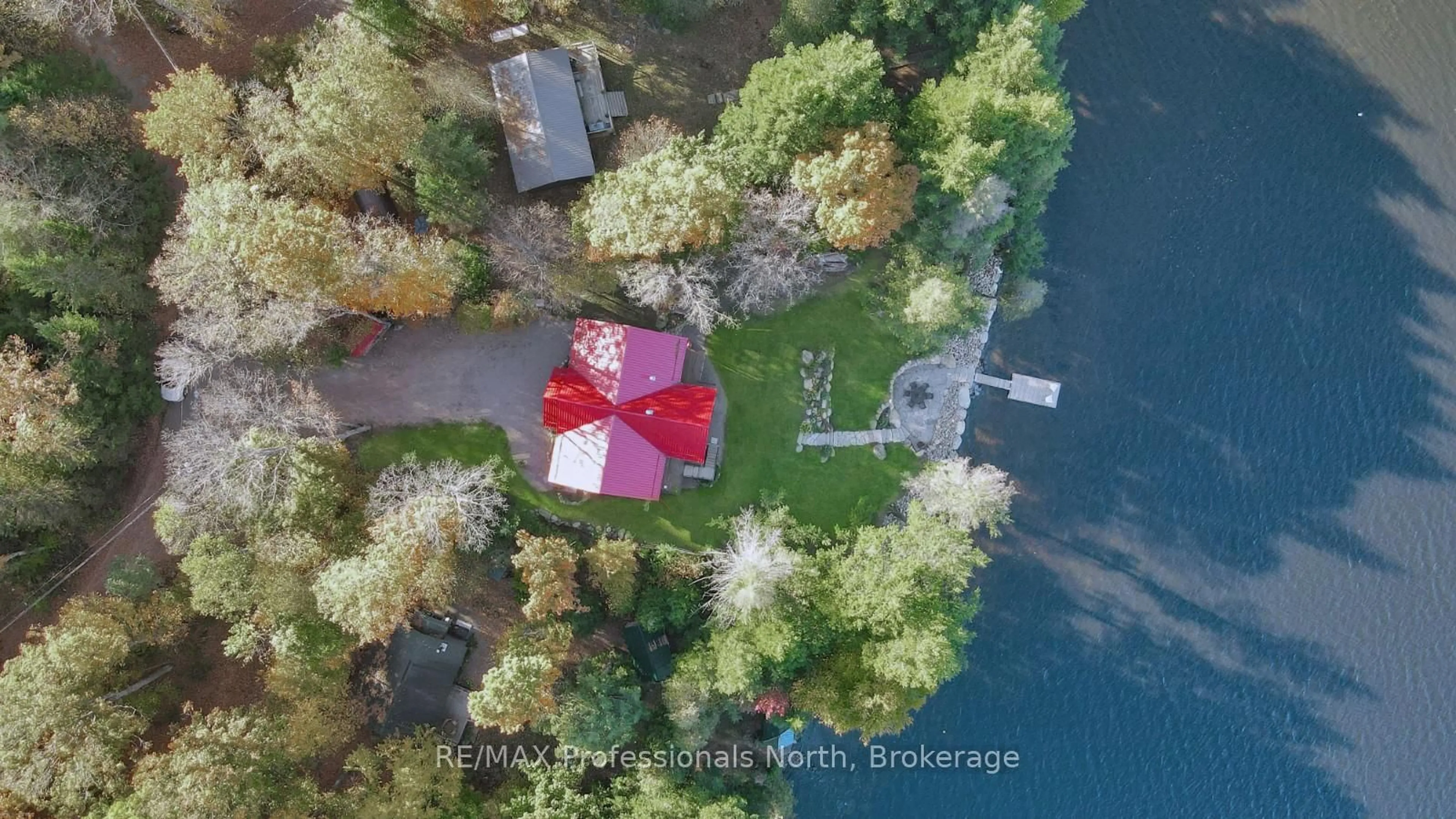 A pic from outside/outdoor area/front of a property/back of a property/a pic from drone, water/lake/river/ocean view for 1204 Jordan Lake Rd, Highlands East Ontario K0L 2A0