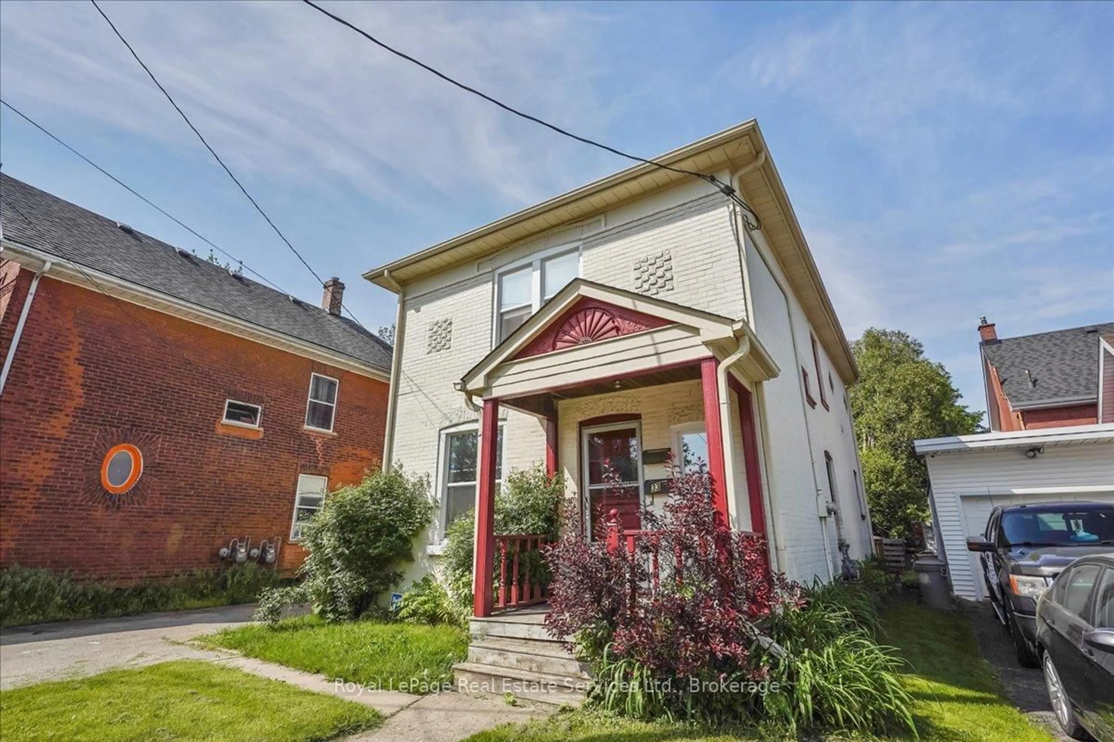 Home with brick exterior material, street for 33 Rose Ave, Brantford Ontario N3S 2M3