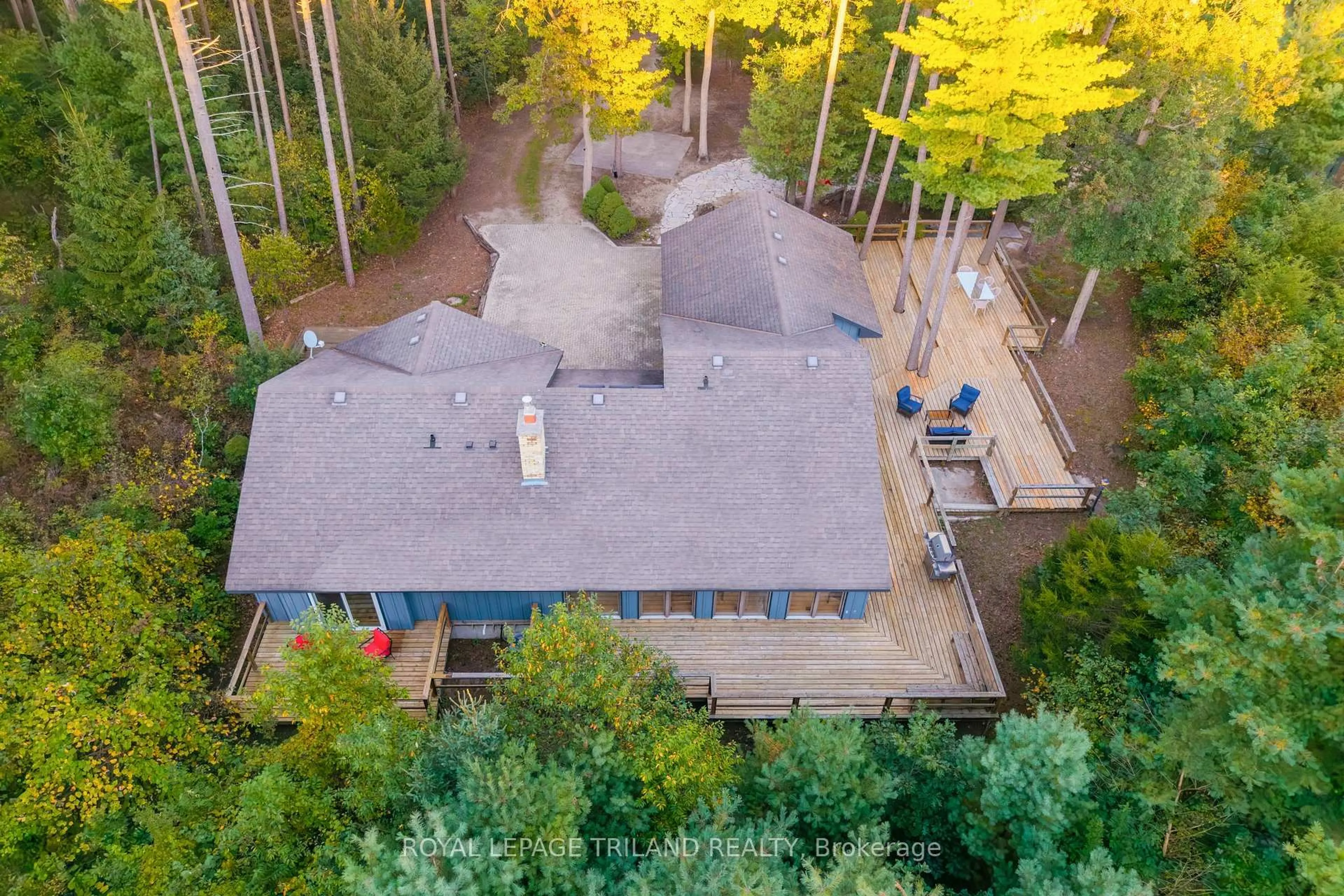A pic from outside/outdoor area/front of a property/back of a property/a pic from drone, forest/trees view for 10395 PINETREE Dr, Lambton Shores Ontario N0M 1T0