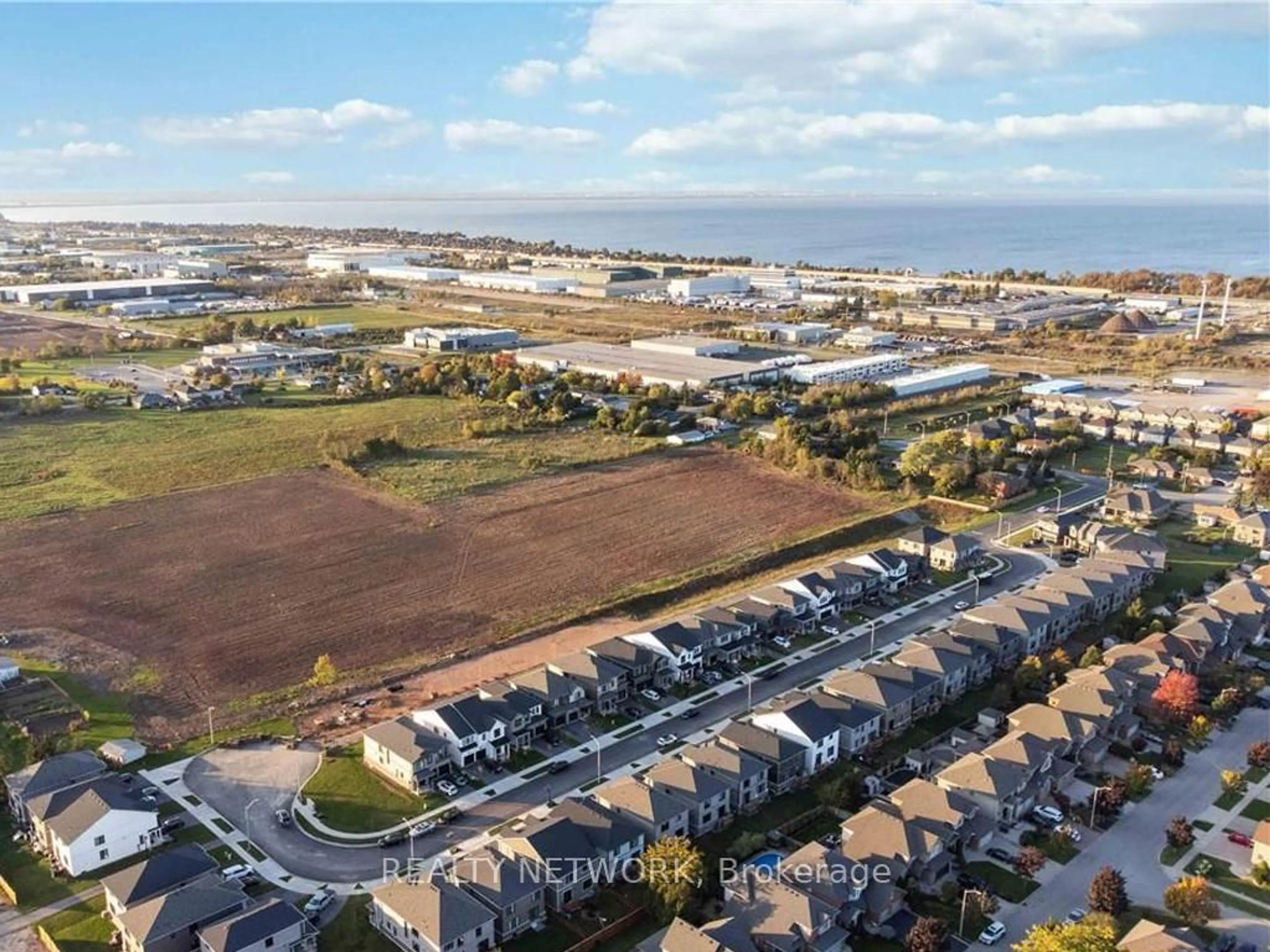 A pic from outside/outdoor area/front of a property/back of a property/a pic from drone, water/lake/river/ocean view for 107 Starfire Cres, Hamilton Ontario L8E 0K9