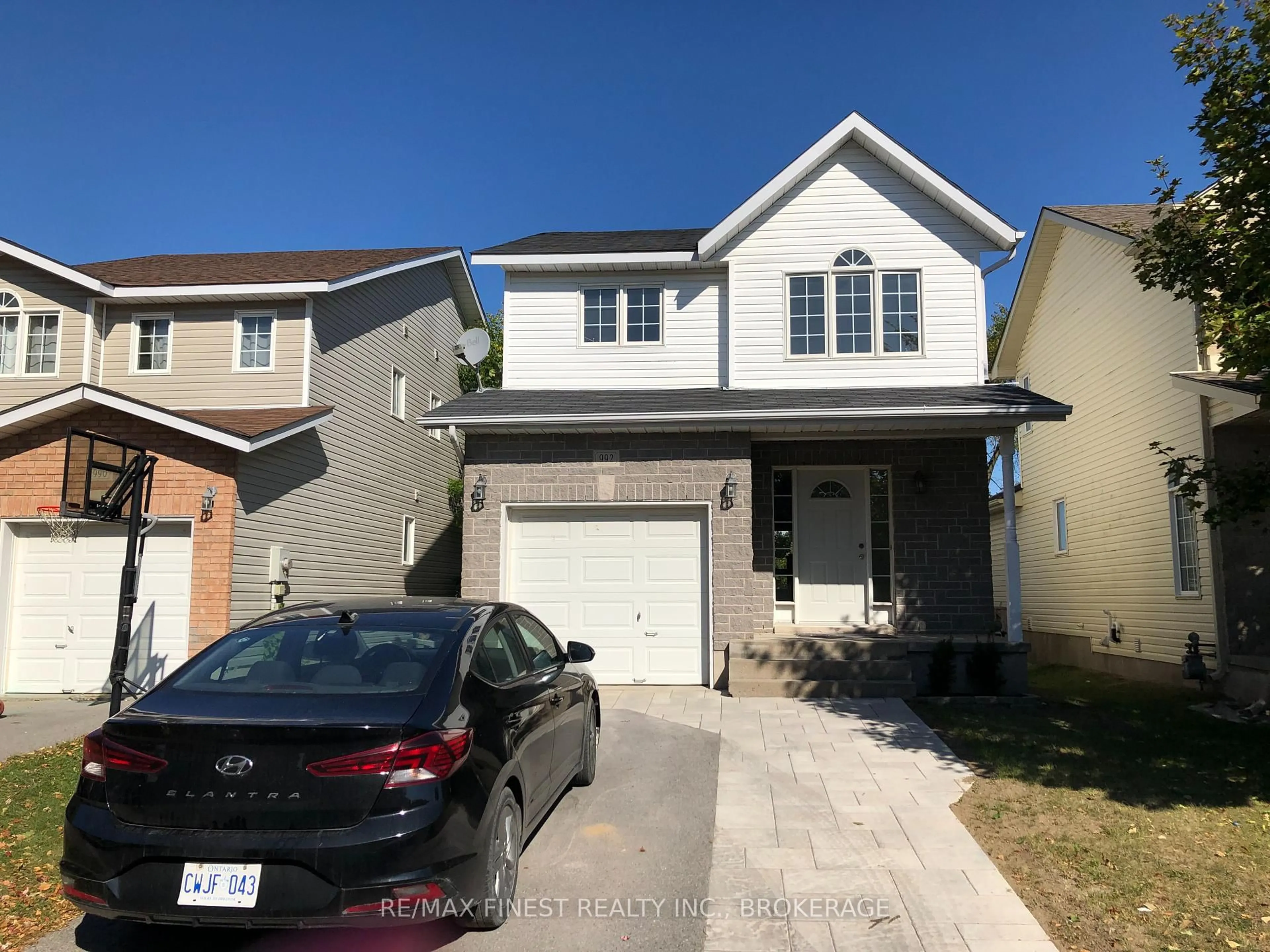 Home with vinyl exterior material, street for 992 Bluffwood Ave, Kingston Ontario K7K 7K6