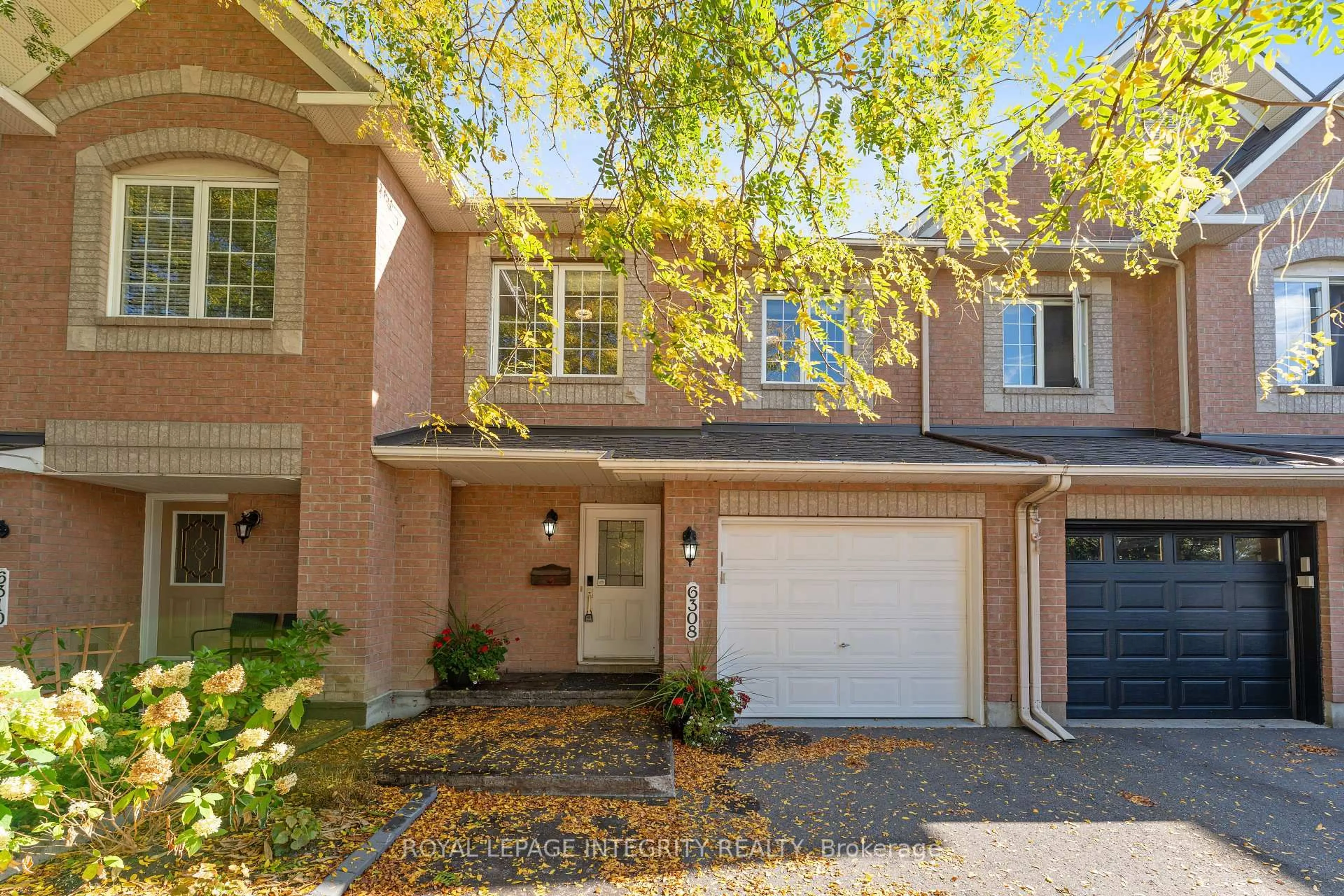 Home with brick exterior material, street for 6308 Sablewood Pl, Ottawa Ontario K1C 7M6