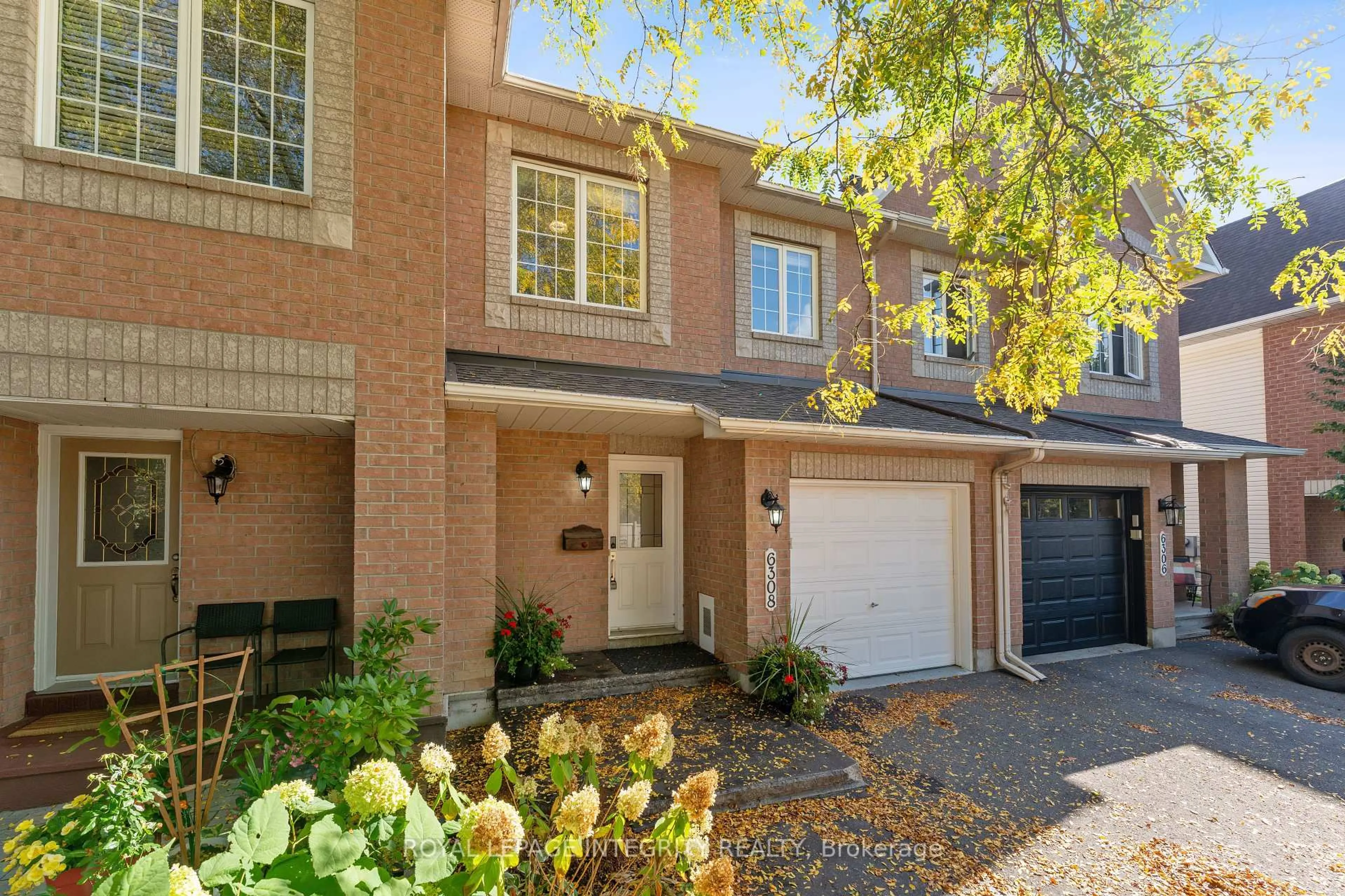 Home with brick exterior material, street for 6308 Sablewood Pl, Ottawa Ontario K1C 7M6