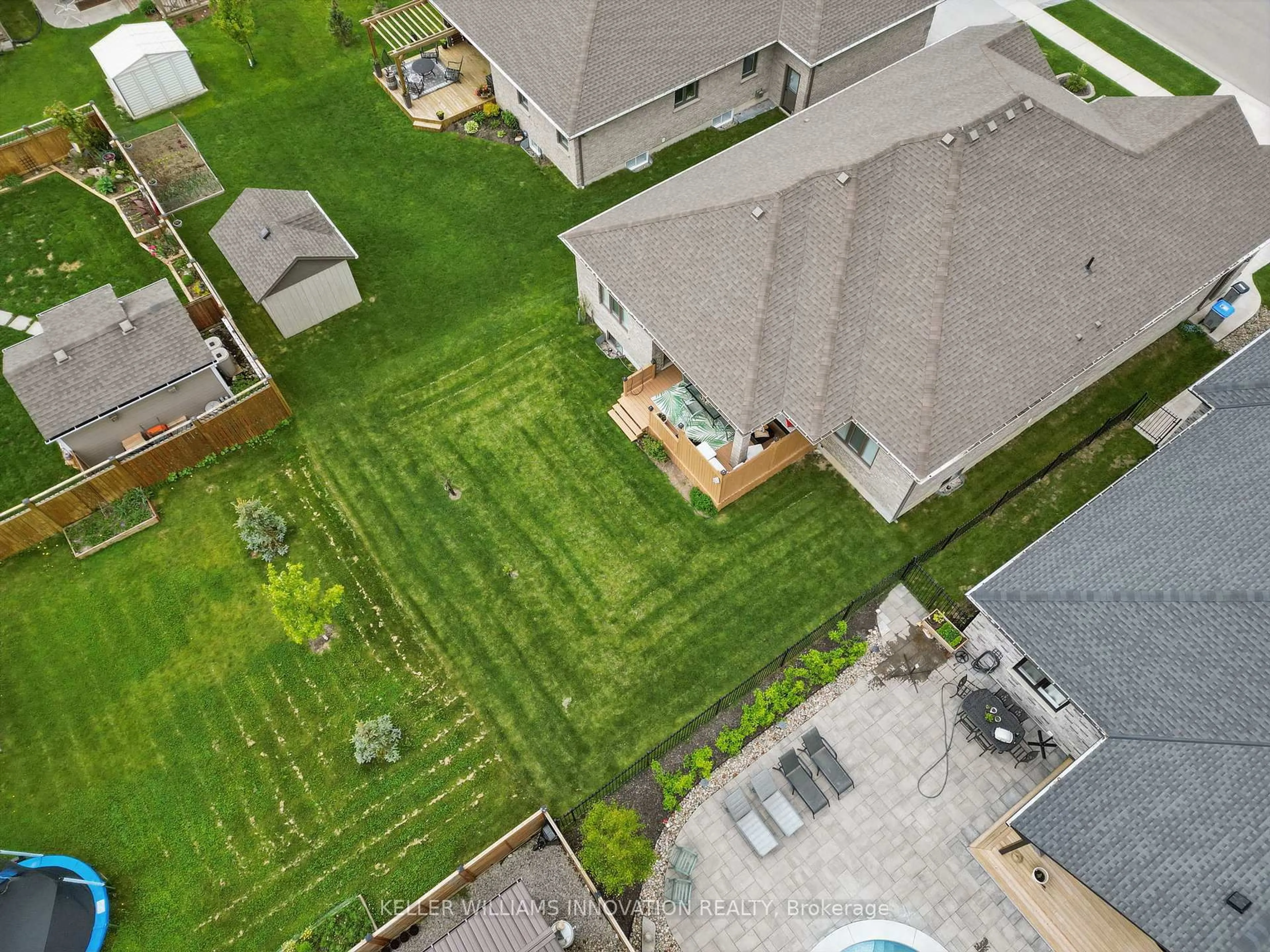 A pic from outside/outdoor area/front of a property/back of a property/a pic from drone, street for 107 Forbes Cres, North Perth Ontario N4W 0B4
