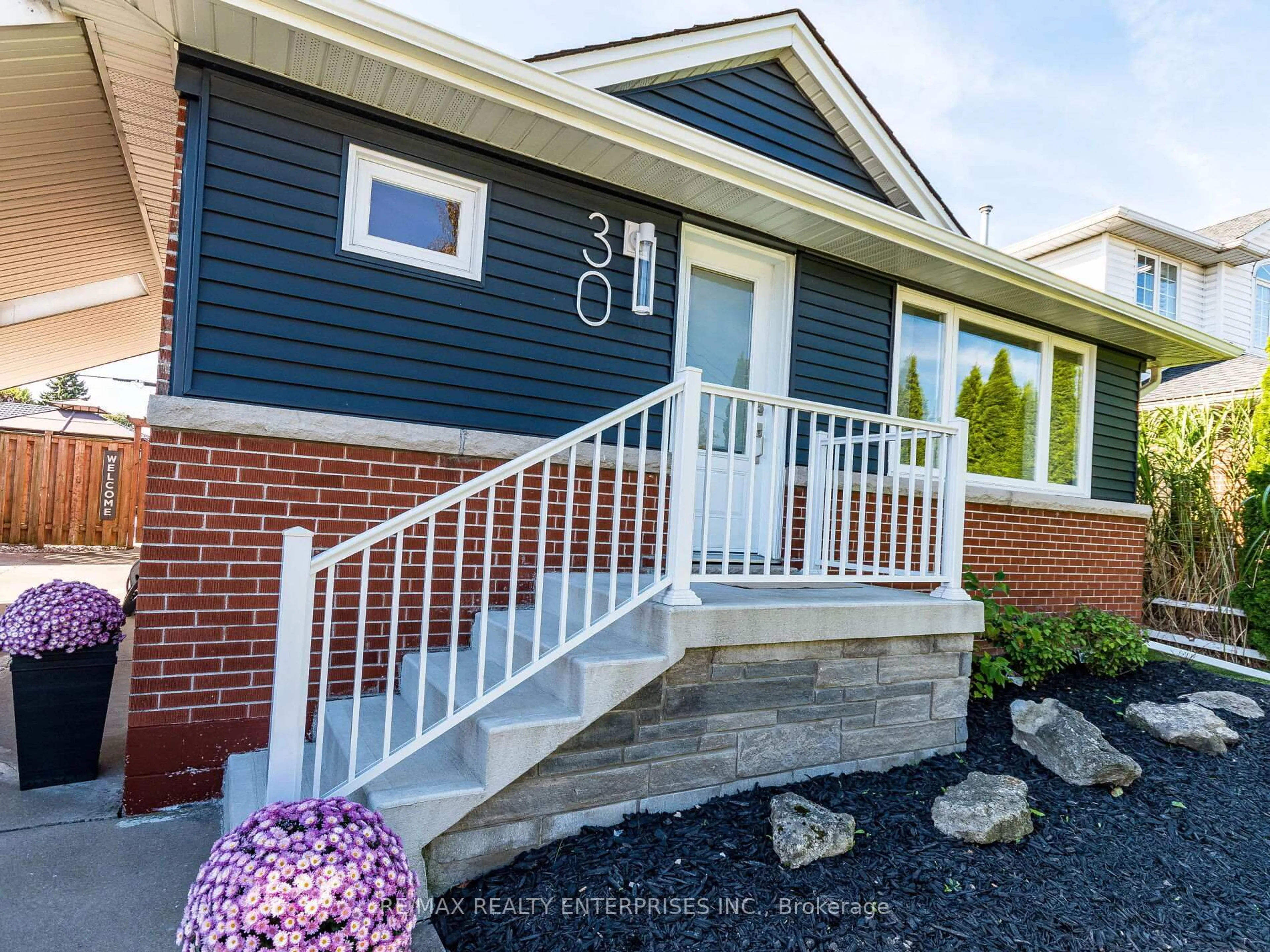 Home with vinyl exterior material, street for 30 Alderney Ave, Hamilton Ontario L9A 2A5