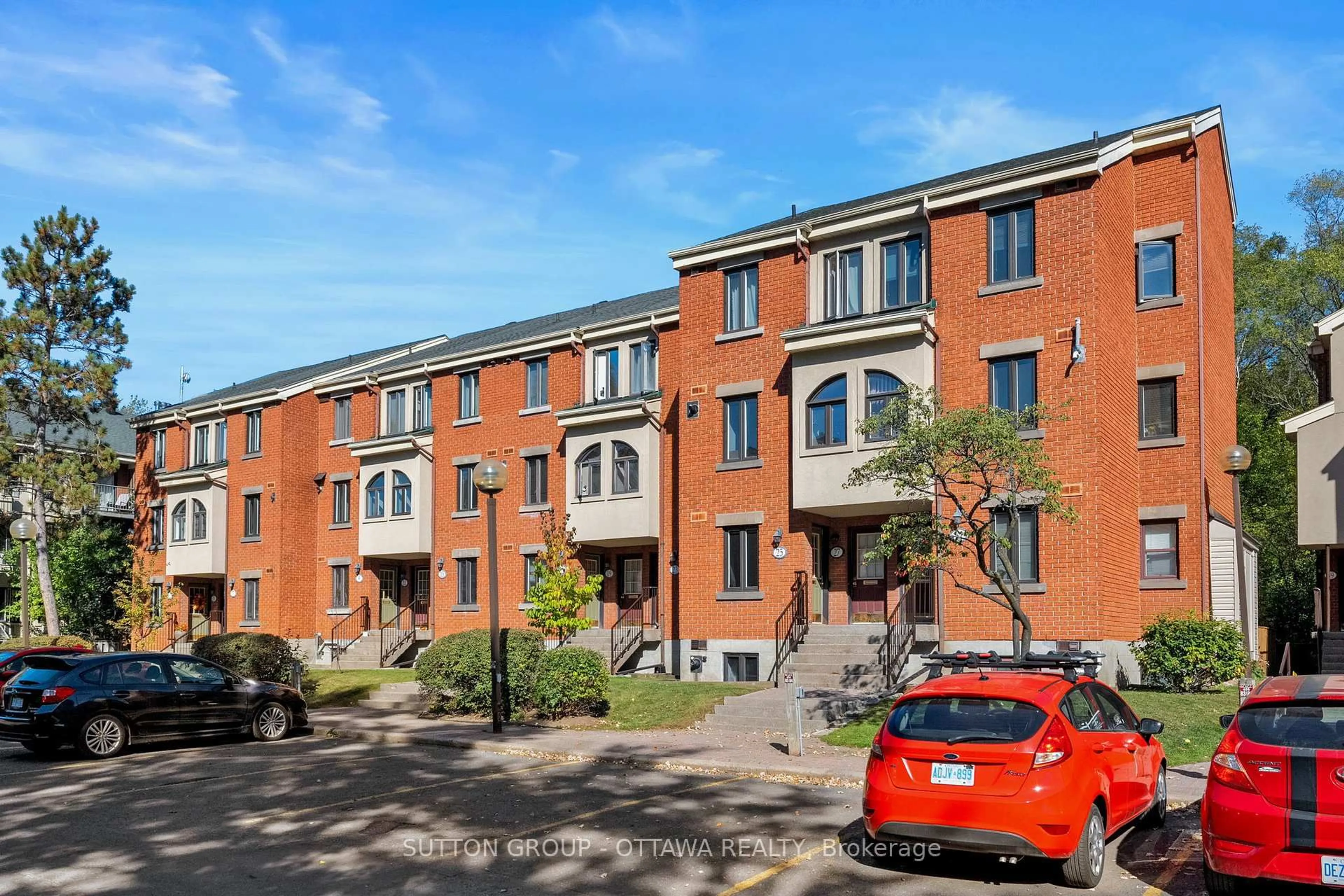 Home with brick exterior material, street for 25 Crispin Private, Ottawa Ontario K1K 2T7